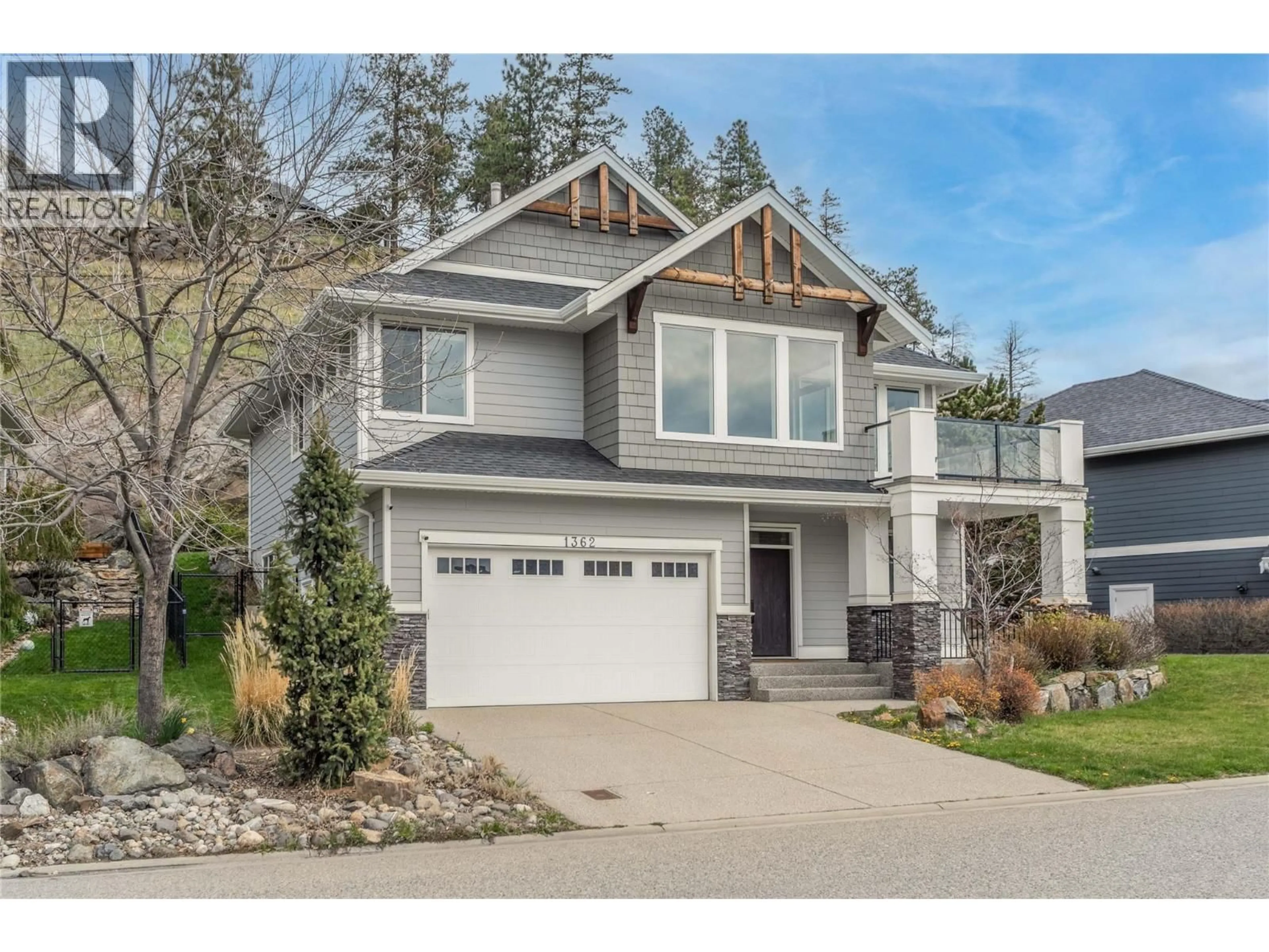 Home with vinyl exterior material, street for 1362 ROCKY POINT DRIVE, Kelowna British Columbia V1V2Z9