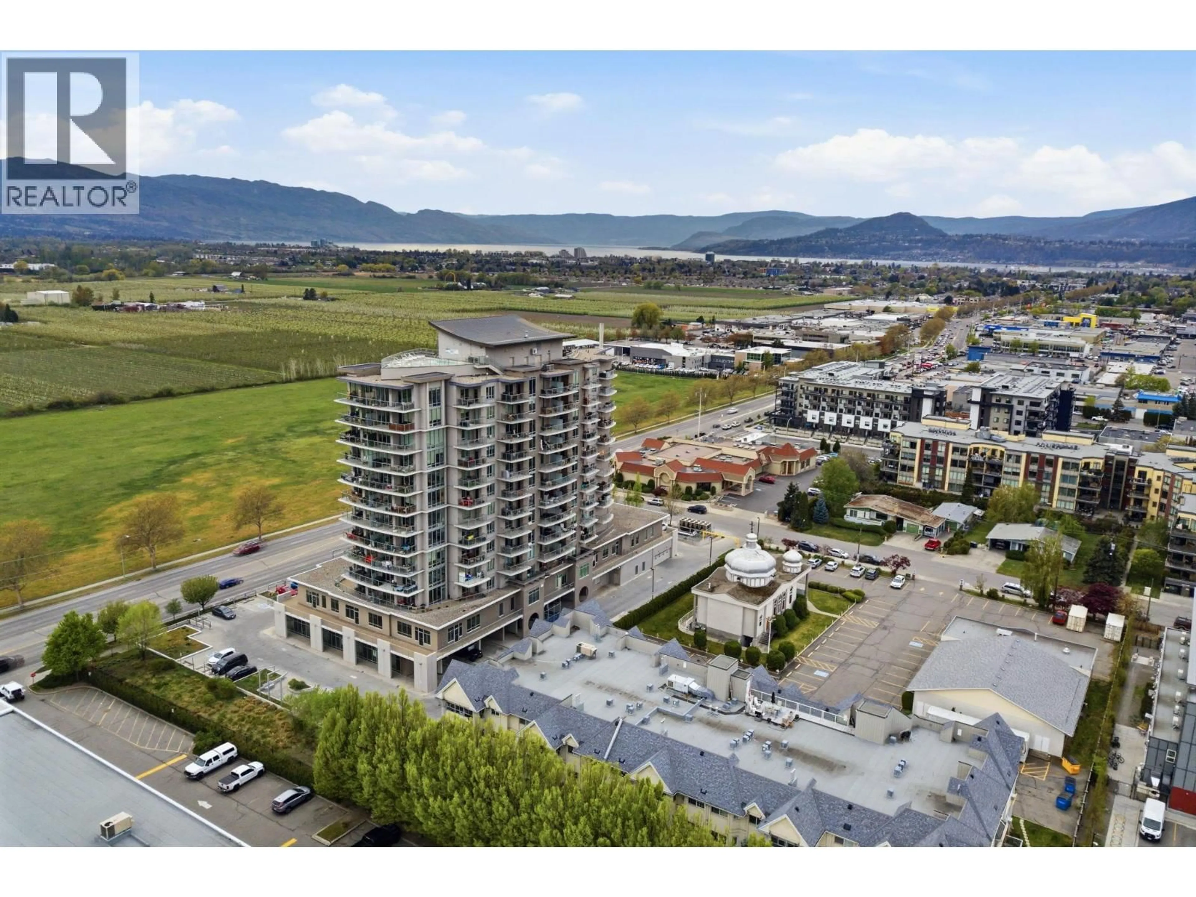 A pic from outside/outdoor area/front of a property/back of a property/a pic from drone, unknown for 402 - 2040 SPRINGFIELD ROAD, Kelowna British Columbia V1Y9N7