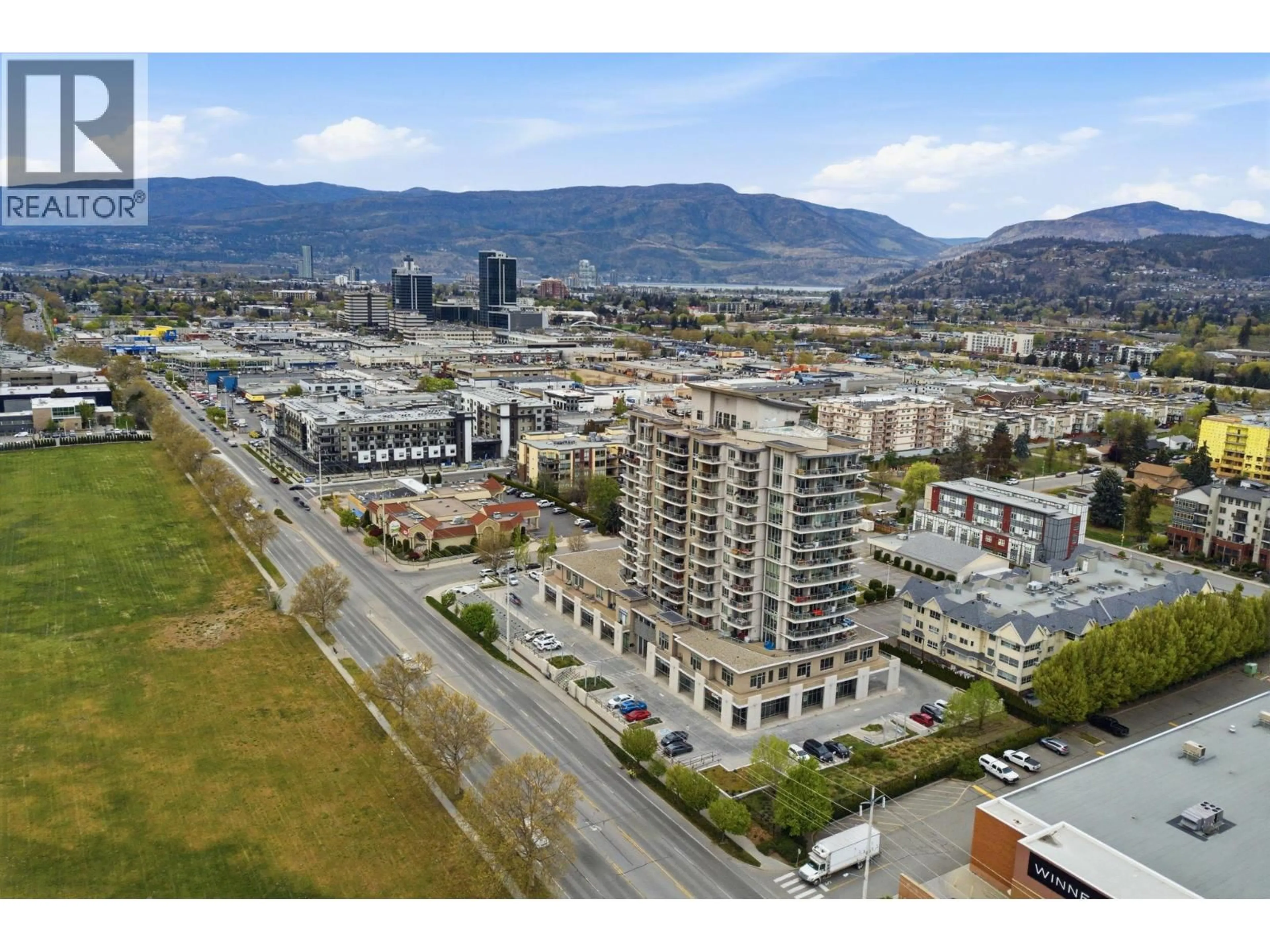 A pic from outside/outdoor area/front of a property/back of a property/a pic from drone, mountain view for 402 - 2040 SPRINGFIELD ROAD, Kelowna British Columbia V1Y9N7