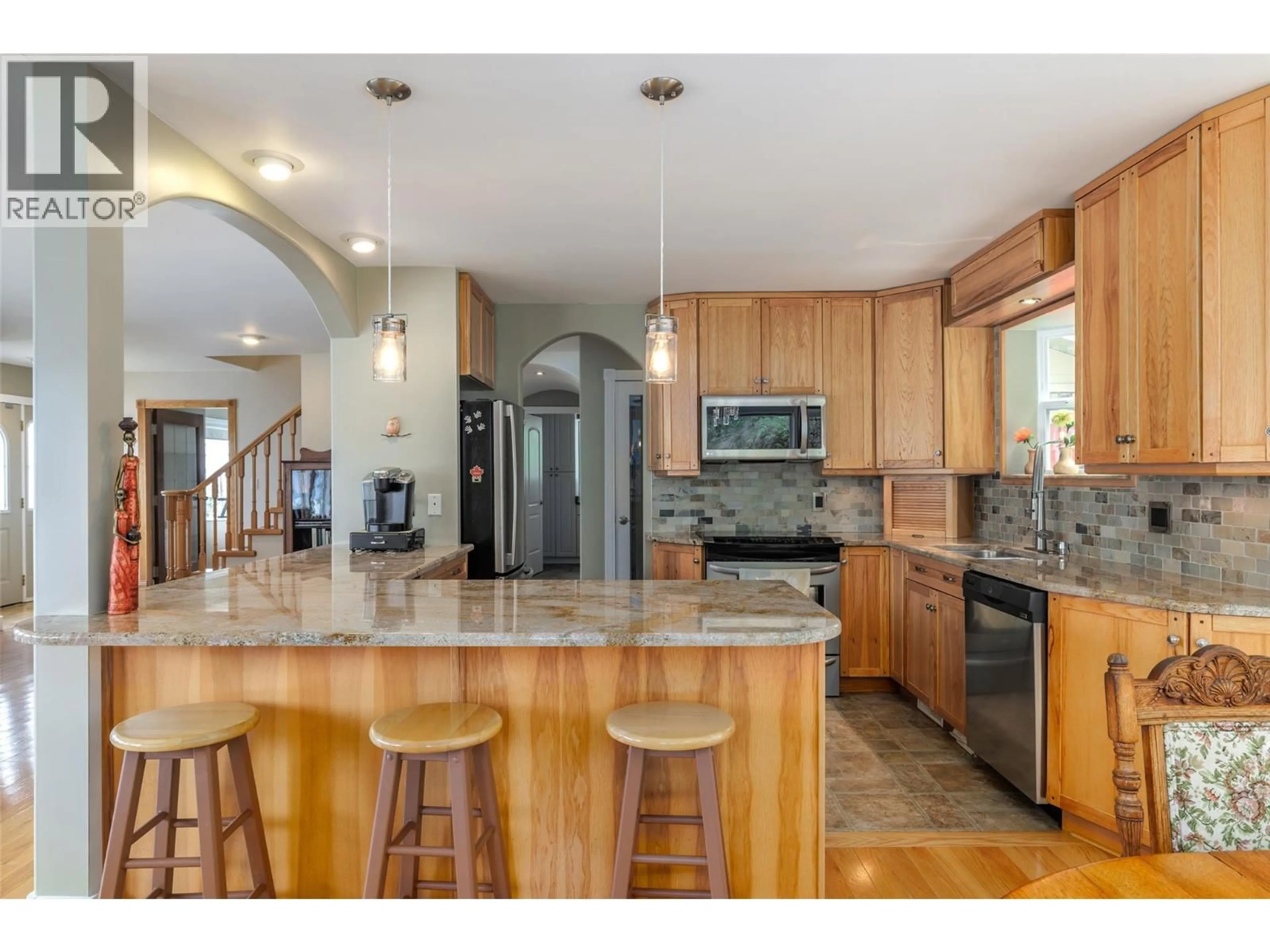 Open concept kitchen, ceramic/tile floor for 17824 JUNIPER COVE ROAD, Lake Country British Columbia V4V1B8