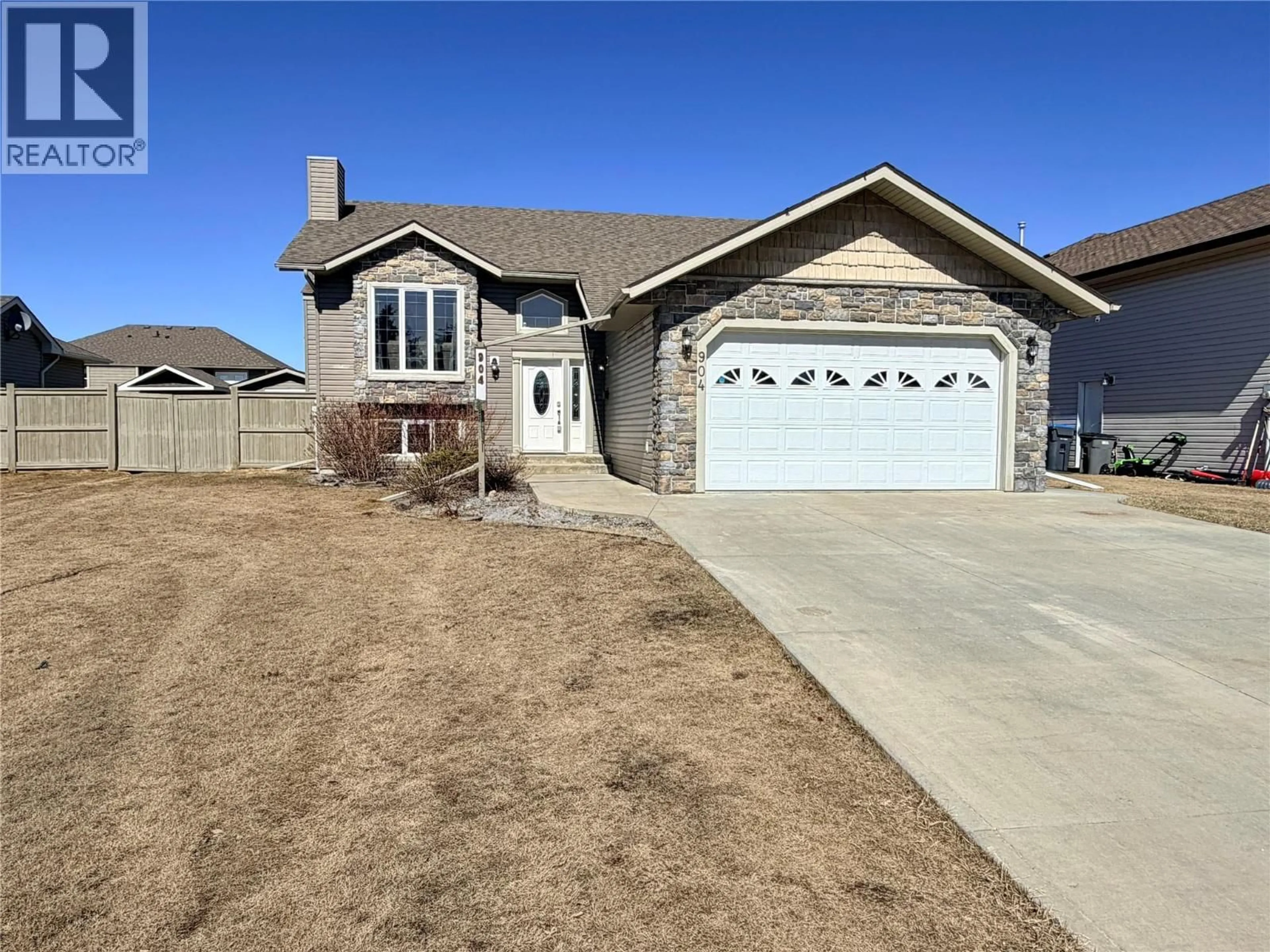 Home with brick exterior material, street for 904 90 AVENUE, Dawson Creek British Columbia V1G5B5