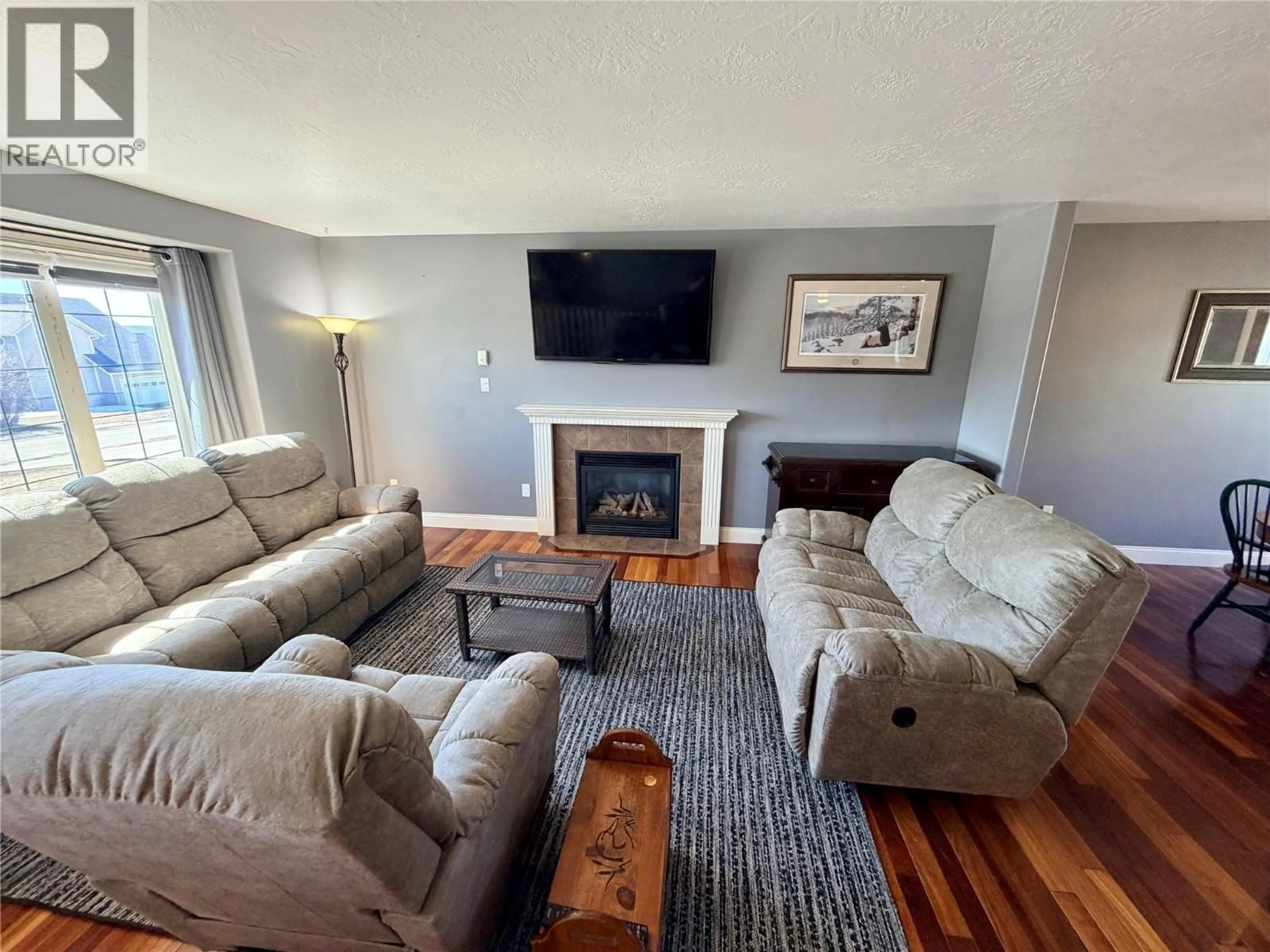 Living room with furniture, unknown for 904 90 AVENUE, Dawson Creek British Columbia V1G5B5