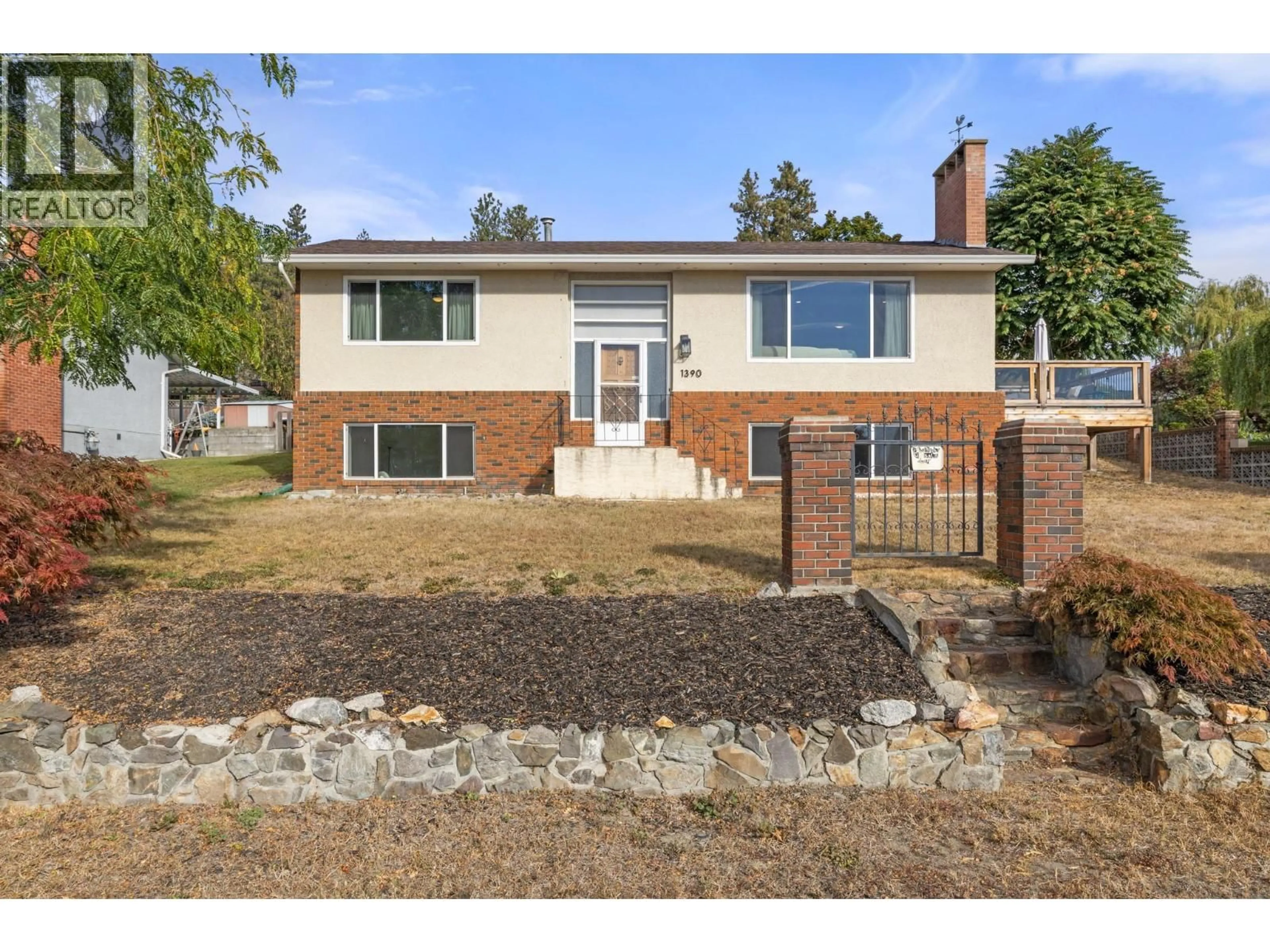 Home with brick exterior material, street for 1390 MOUNTAIN AVENUE, Kelowna British Columbia V1Y7H4