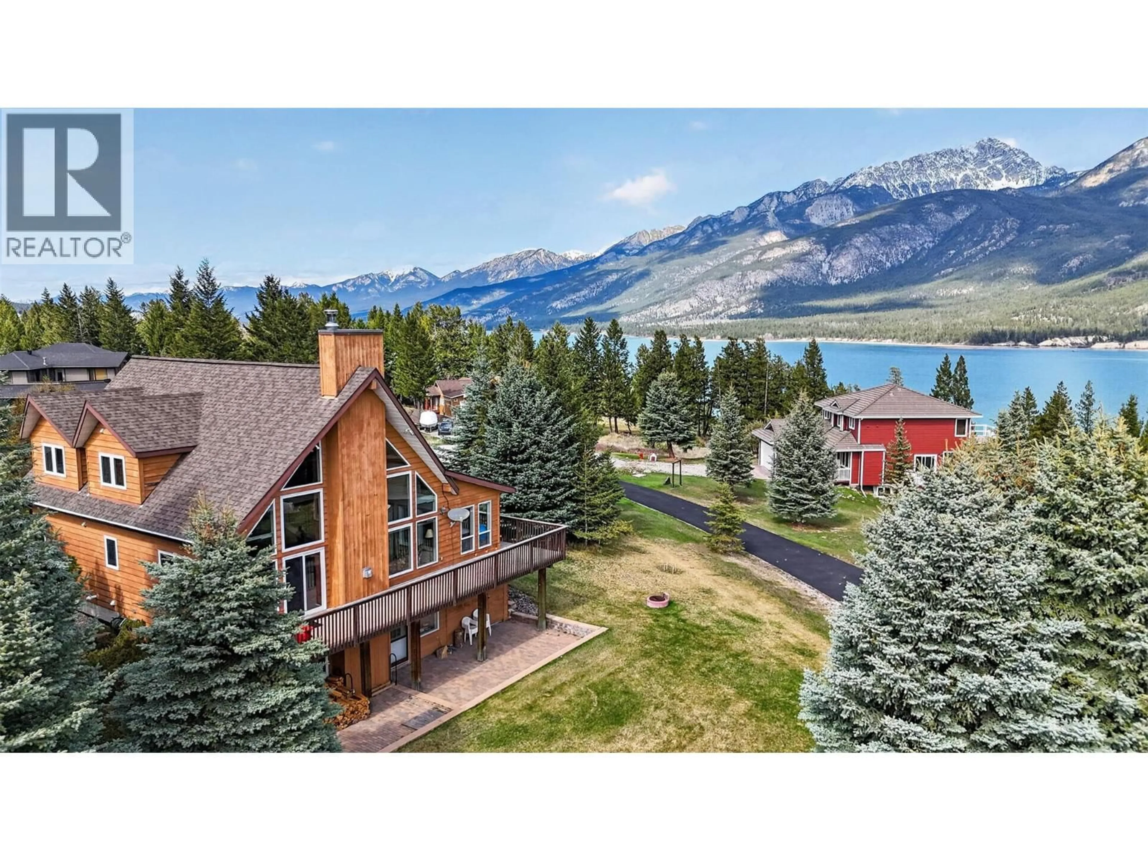 A pic from outside/outdoor area/front of a property/back of a property/a pic from drone, mountain view for 4484 SPRUCE BAY, Fairmont Hot Springs British Columbia V0B1L2