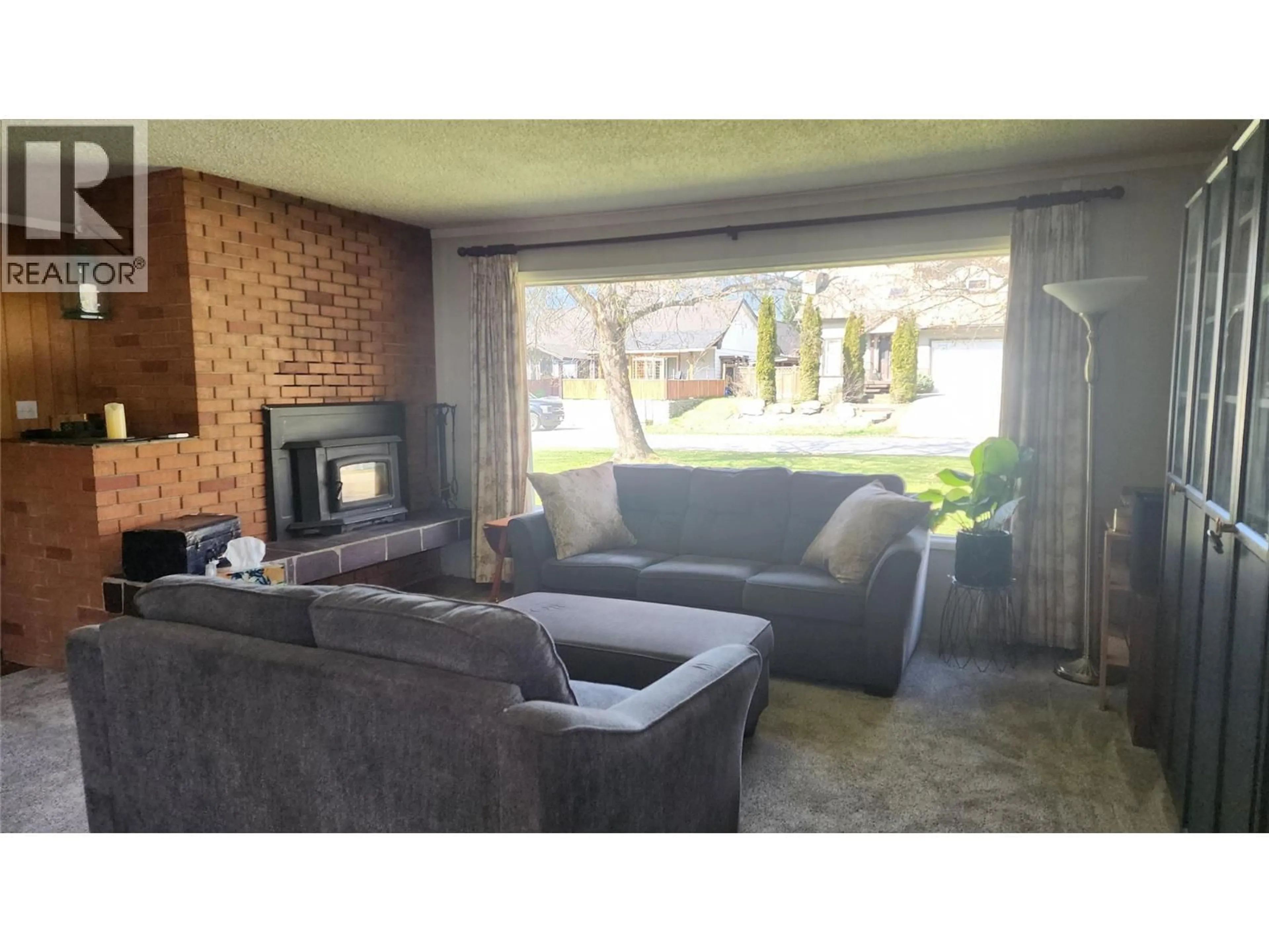 Living room with furniture, unknown for 119 2ND AVENUE NORTHWEST, Nakusp British Columbia V0G1R0