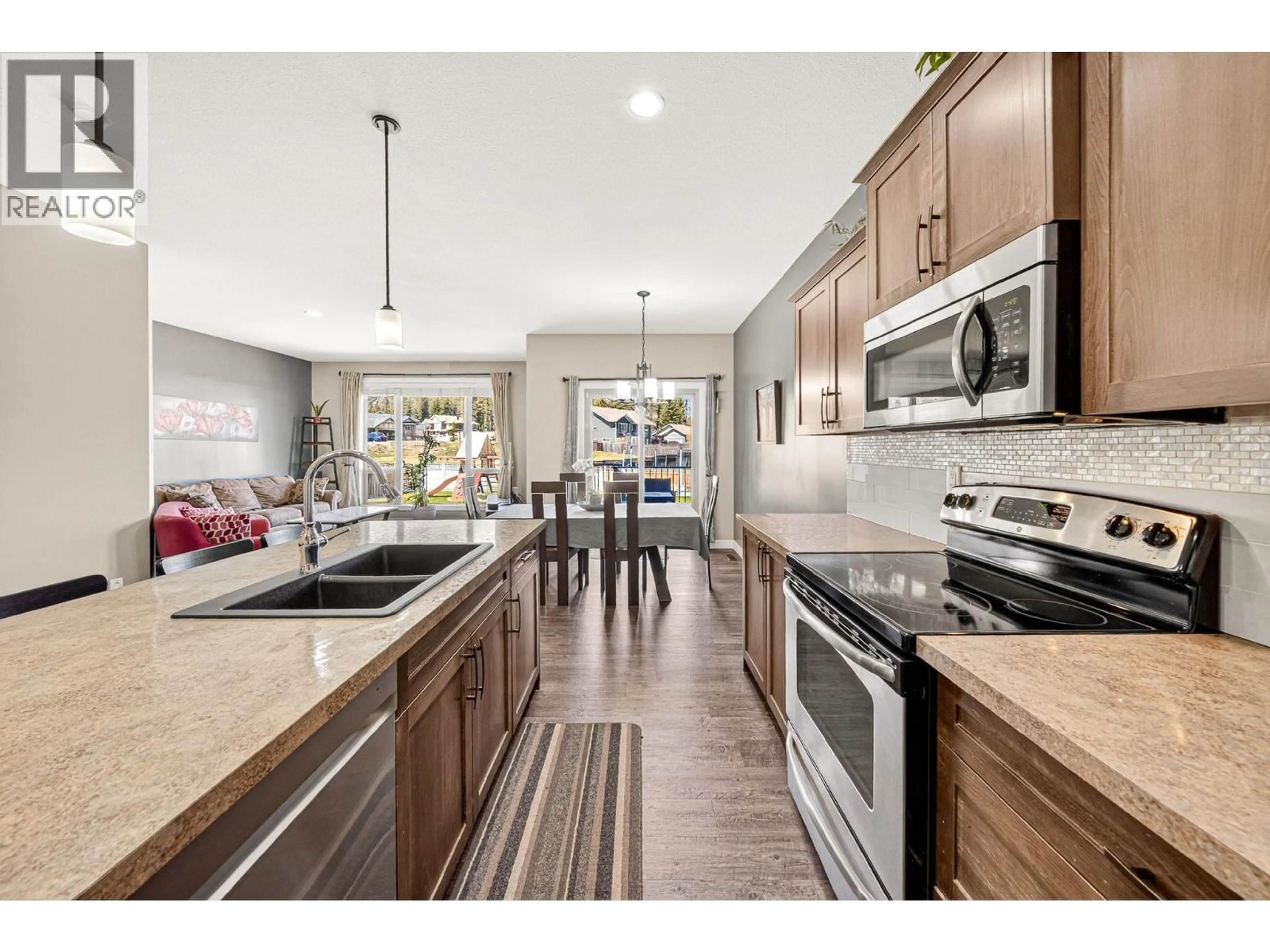 Open concept kitchen, ceramic/tile floor for 2309 FALCON COURT, Sparwood British Columbia V0B2G2