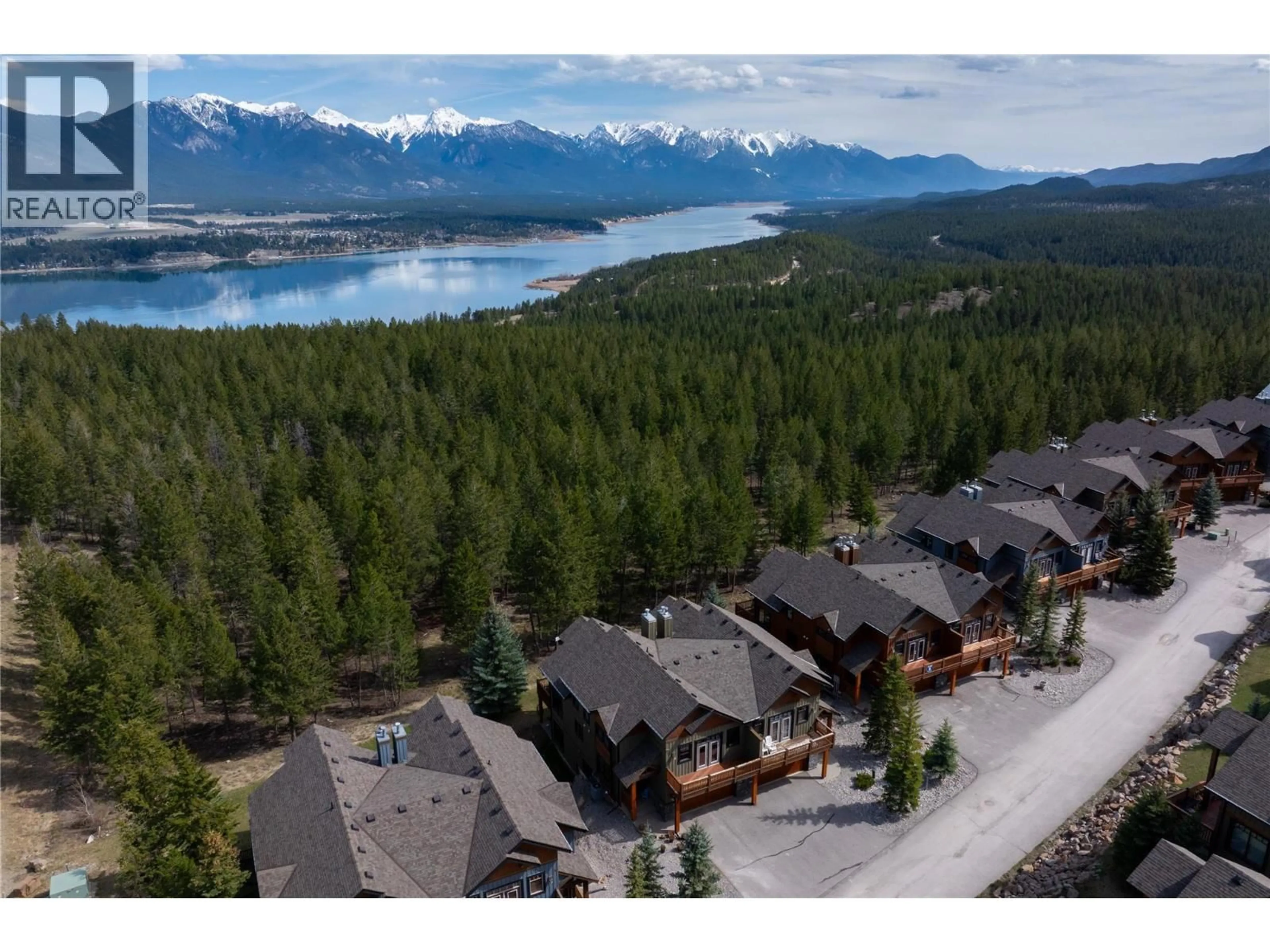 A pic from outside/outdoor area/front of a property/back of a property/a pic from drone, mountain view for 3 - 2600 RIVERROCK WAY, Invermere British Columbia V0A1K6