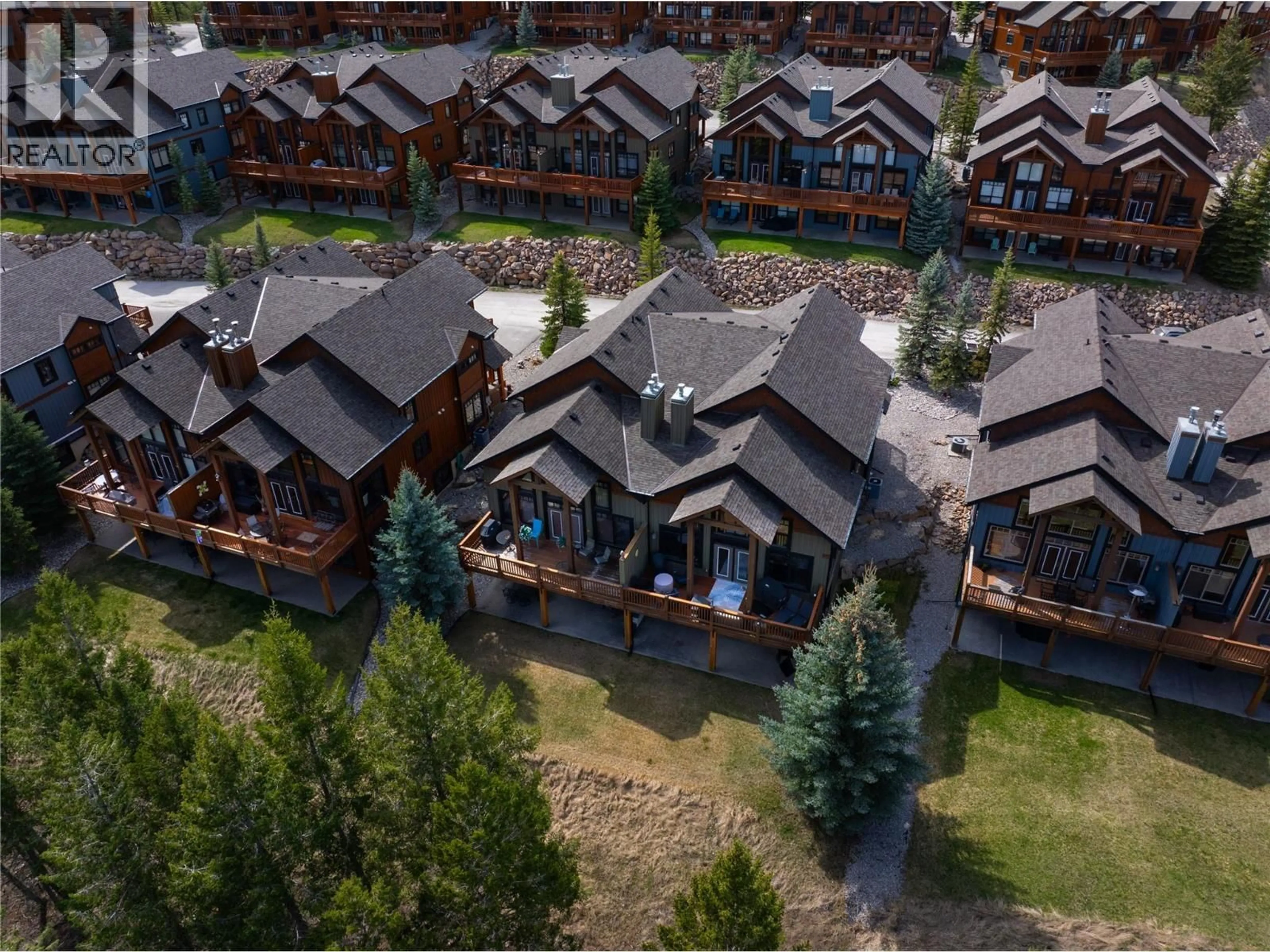 A pic from outside/outdoor area/front of a property/back of a property/a pic from drone, unknown for 3 - 2600 RIVERROCK WAY, Invermere British Columbia V0A1K6