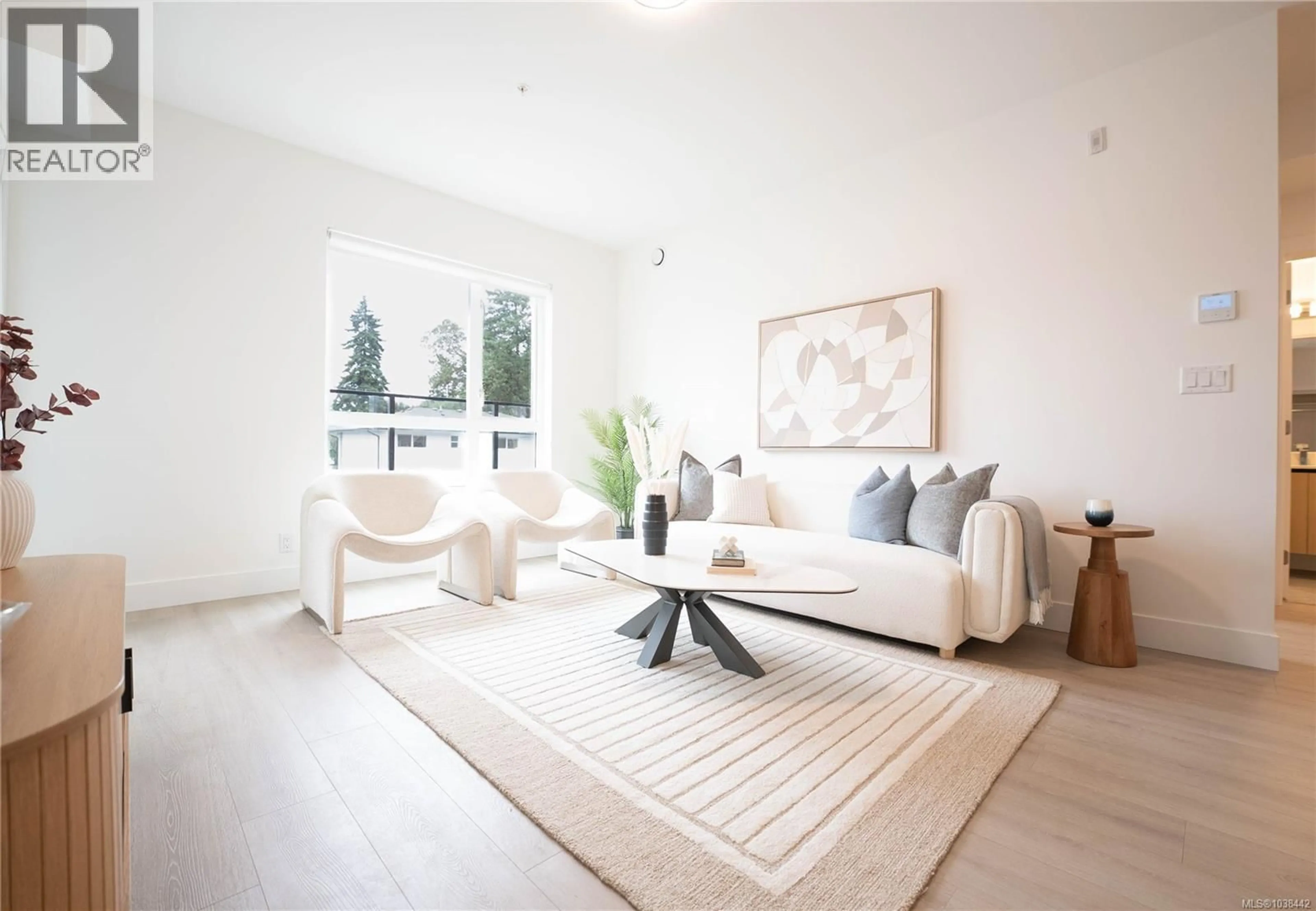 Living room with furniture, unknown for 202 - 258 HELMCKEN ROAD, View Royal British Columbia V9B7G9
