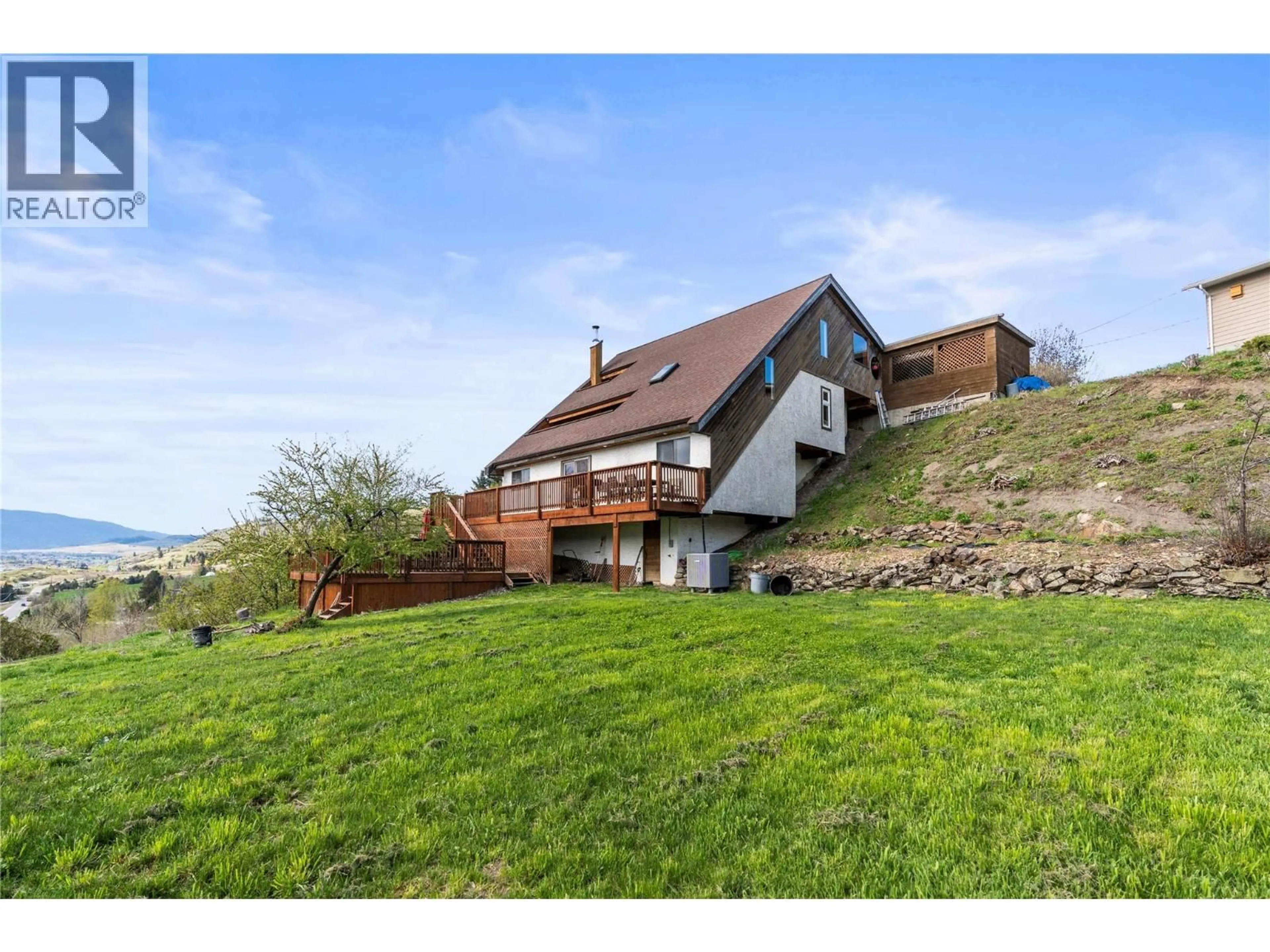 A pic from outside/outdoor area/front of a property/back of a property/a pic from drone, mountain view for 6515 EAGLE ROAD, Vernon British Columbia V1H1W4