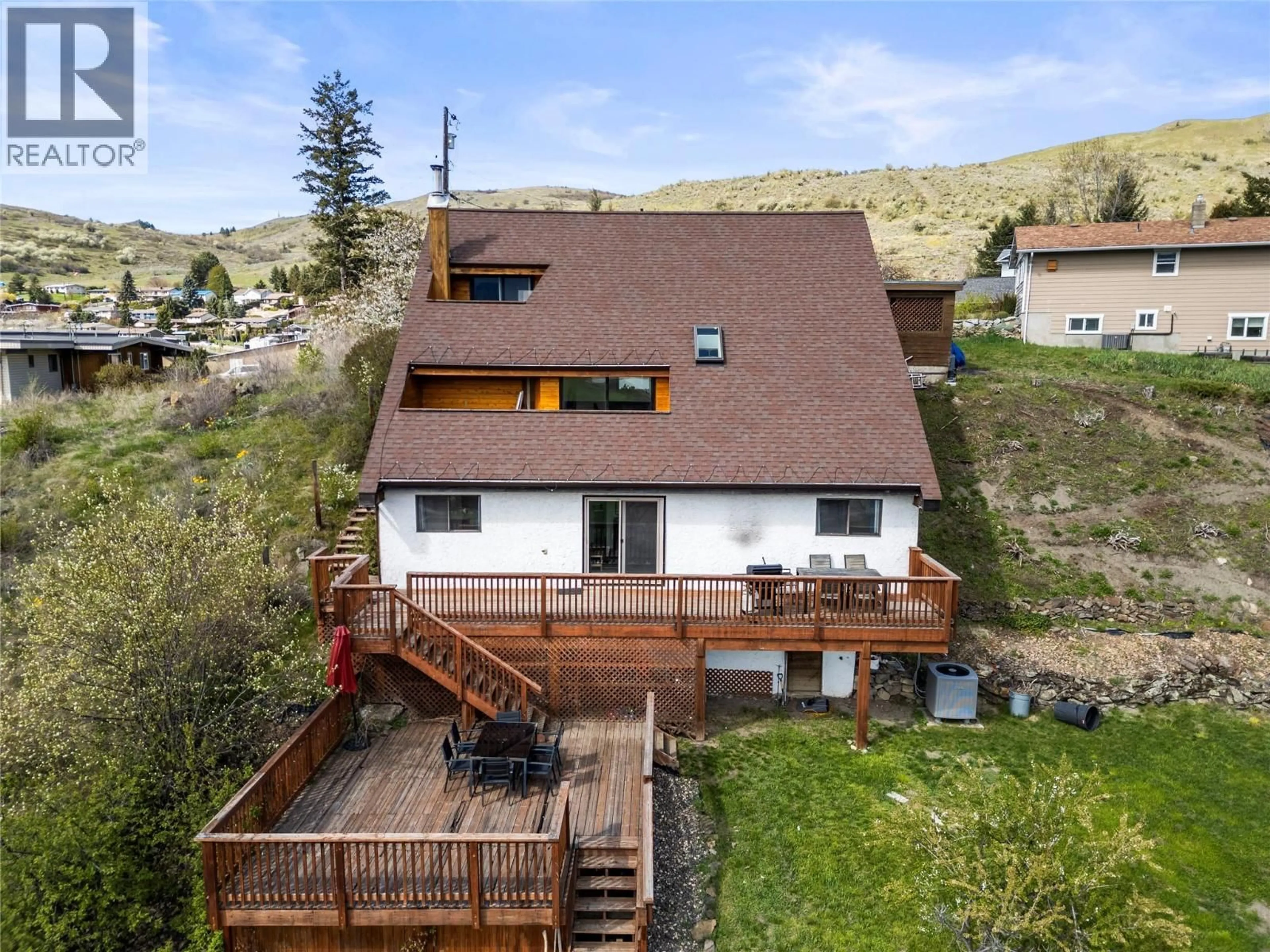 A pic from outside/outdoor area/front of a property/back of a property/a pic from drone, mountain view for 6515 EAGLE ROAD, Vernon British Columbia V1H1W4