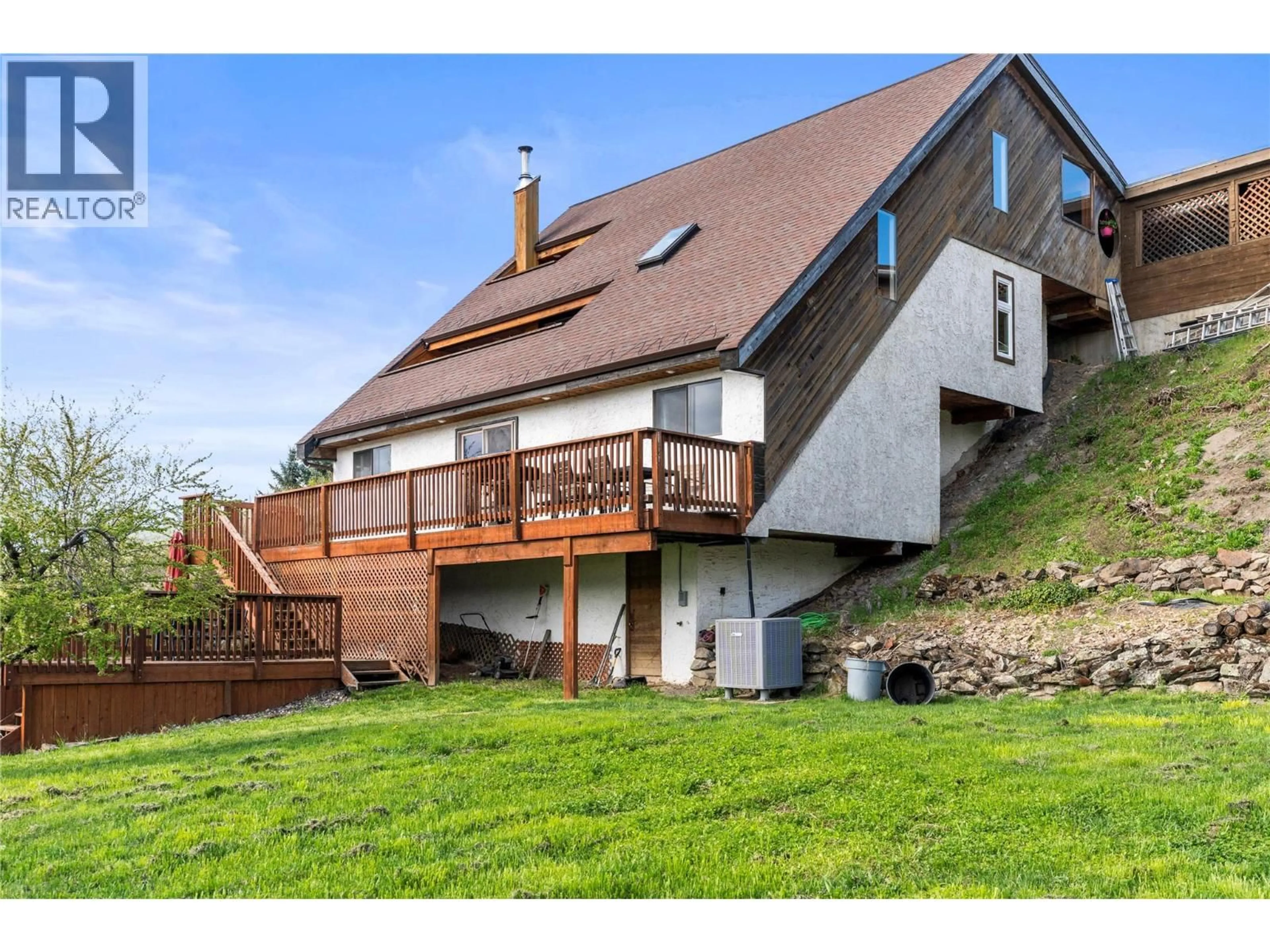 A pic from outside/outdoor area/front of a property/back of a property/a pic from drone, mountain view for 6515 EAGLE ROAD, Vernon British Columbia V1H1W4