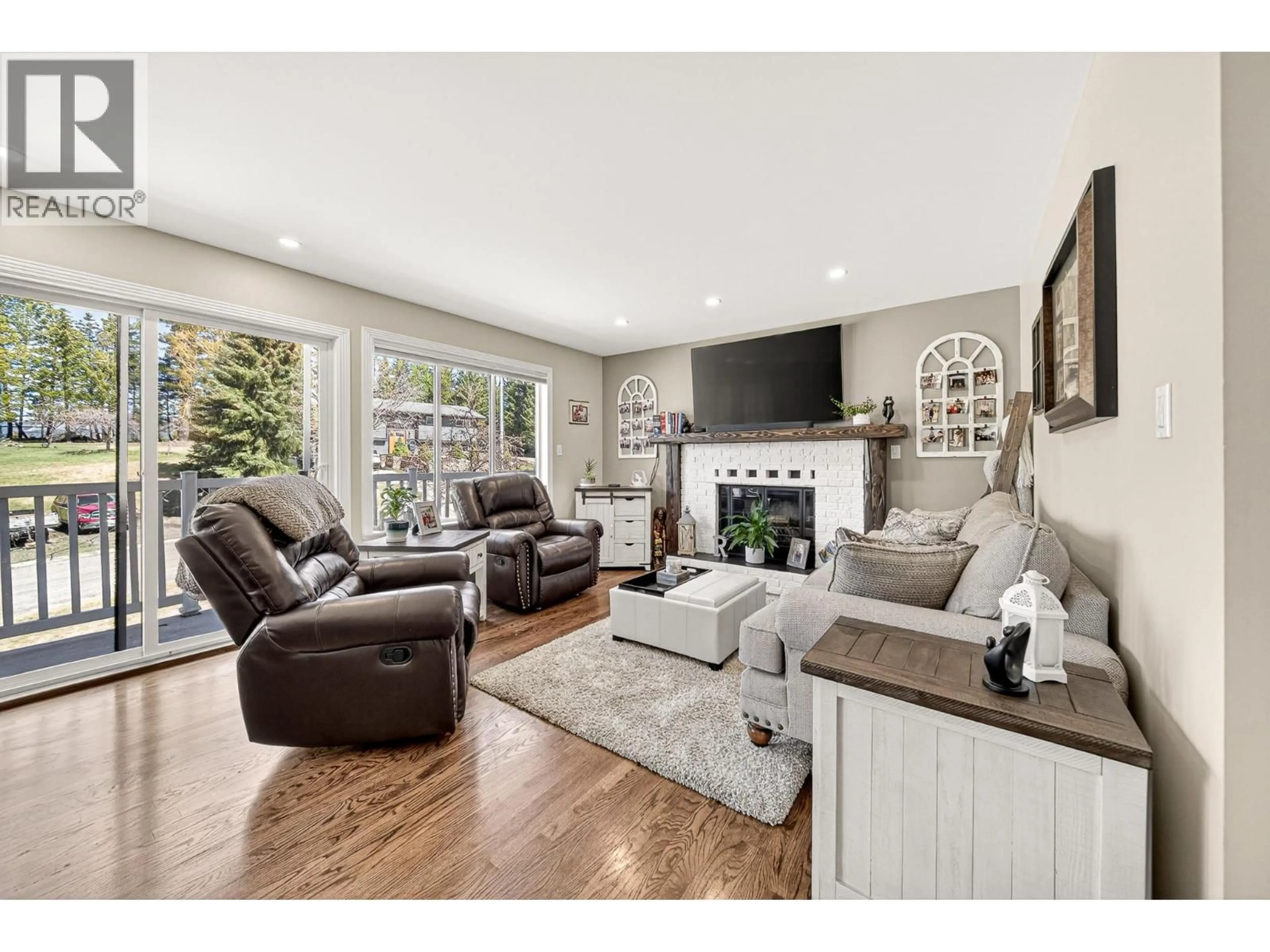 Living room with furniture, wood/laminate floor for 6 & 7 CLEARWATER PLACE, Elkford British Columbia V0B1H0