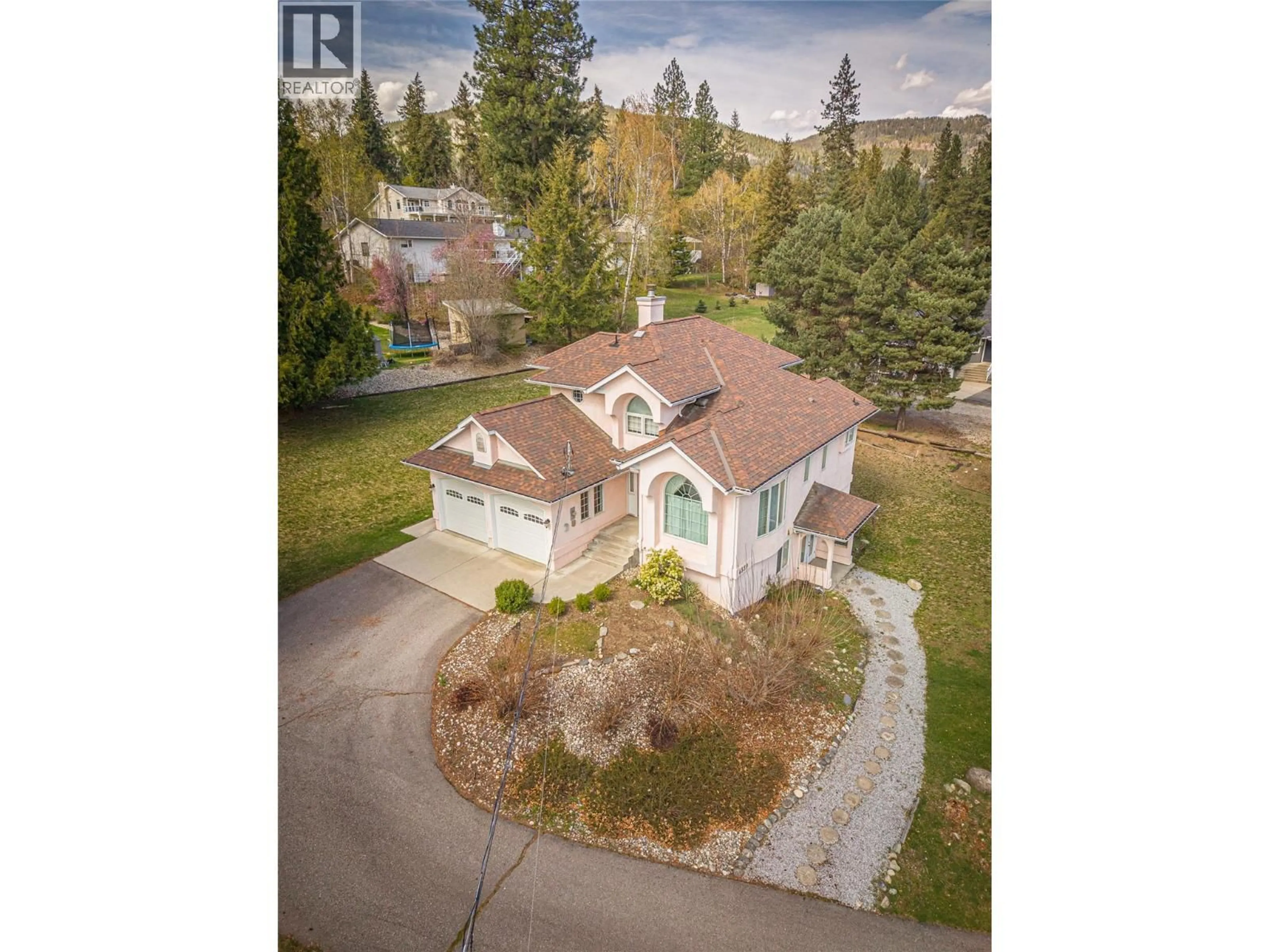 A pic from outside/outdoor area/front of a property/back of a property/a pic from drone, street for 4339 VIEW RIDGE ROAD, Bonnington British Columbia V0G2G3