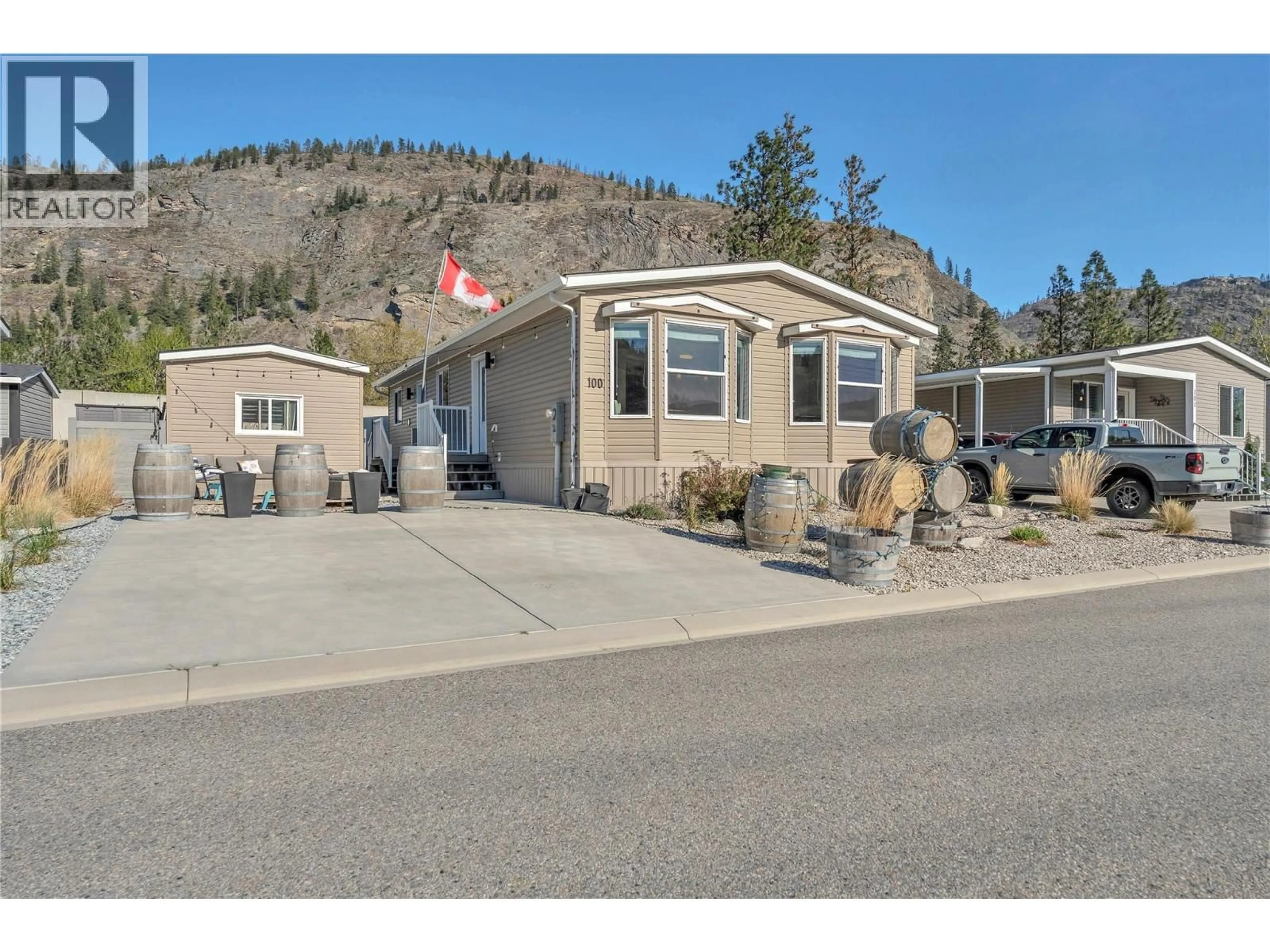Home with vinyl exterior material, mountain view for 8598 HWY 97 HIGHWAY, Oliver British Columbia V0H1T2