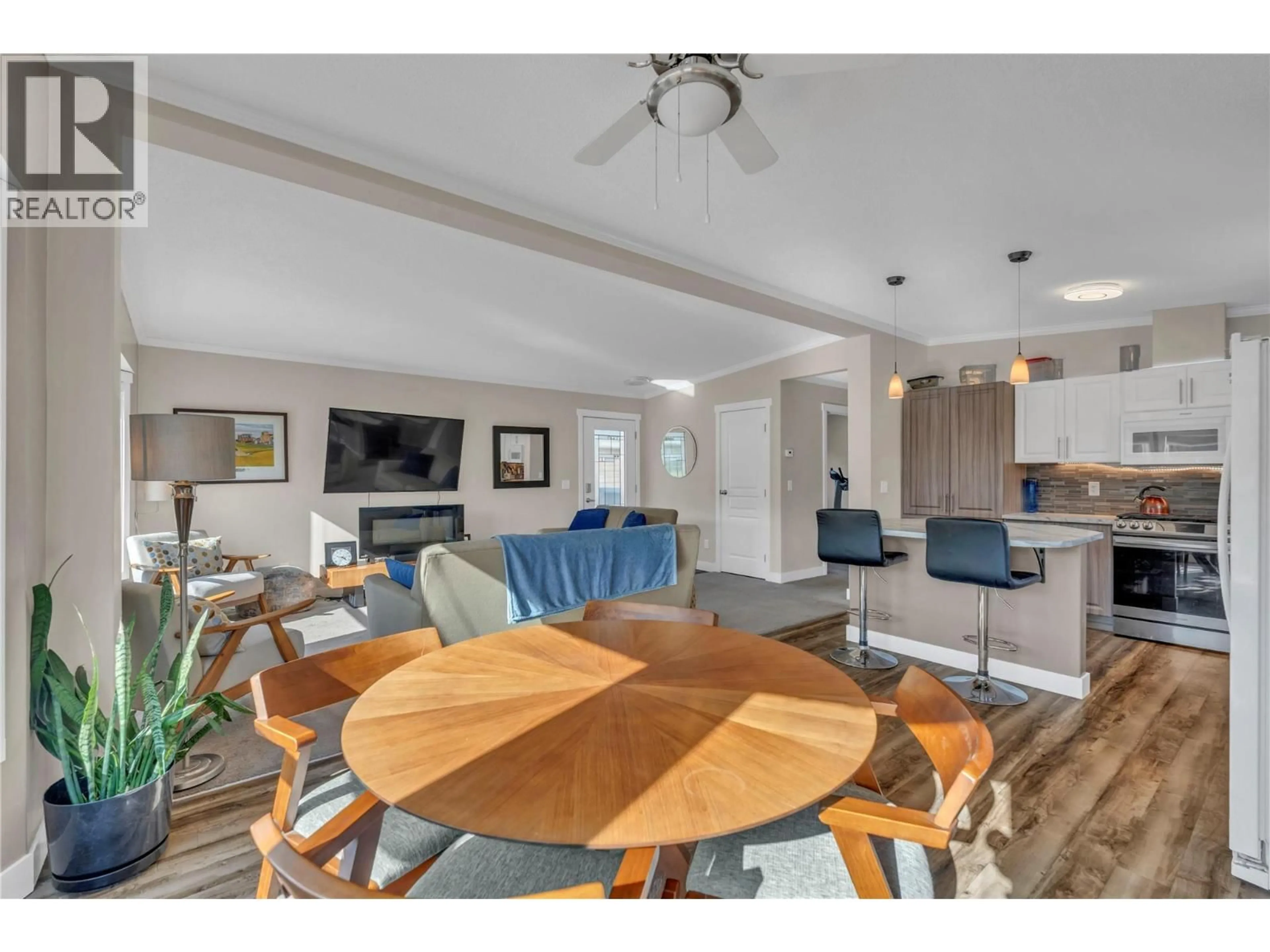 Open concept kitchen, wood/laminate floor for 8598 HWY 97 HIGHWAY, Oliver British Columbia V0H1T2