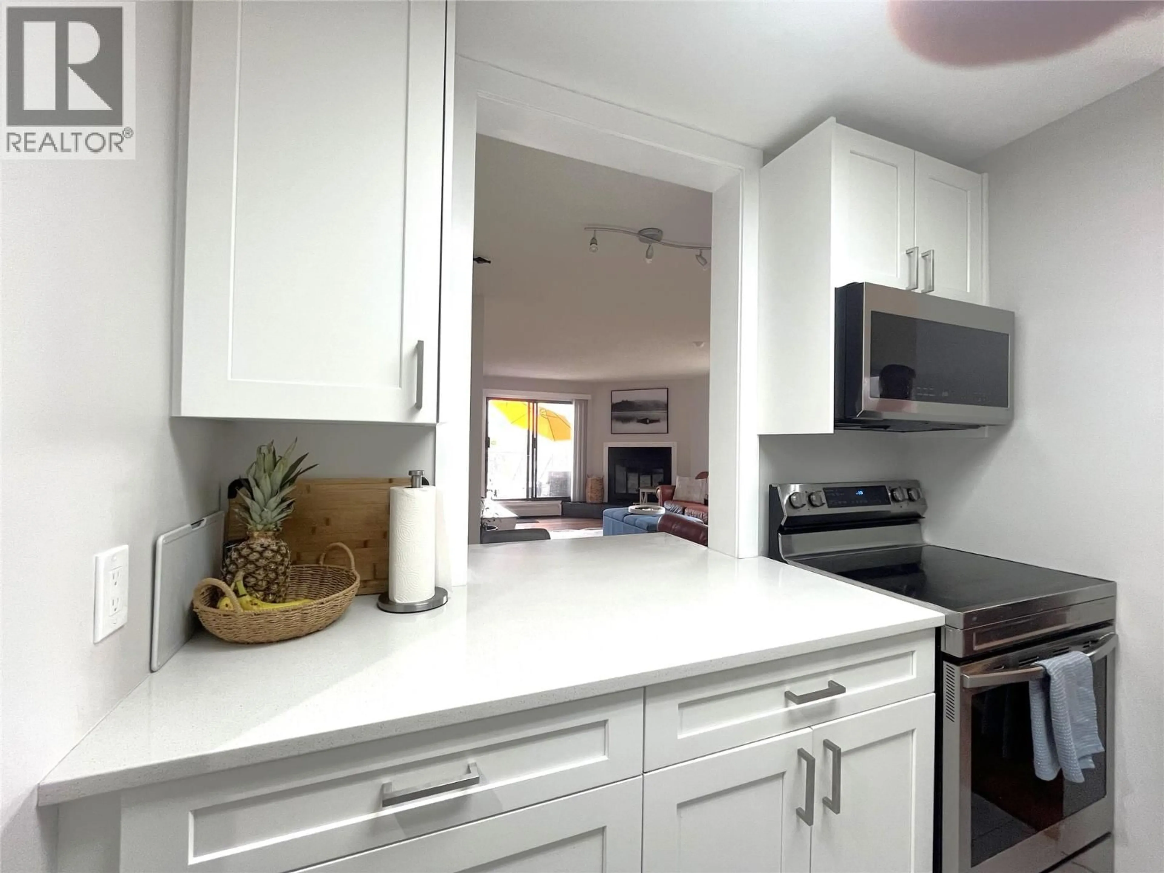 Contemporary kitchen, ceramic/tile floor for 113 - 3901 32 AVENUE, Vernon British Columbia V1T8M3