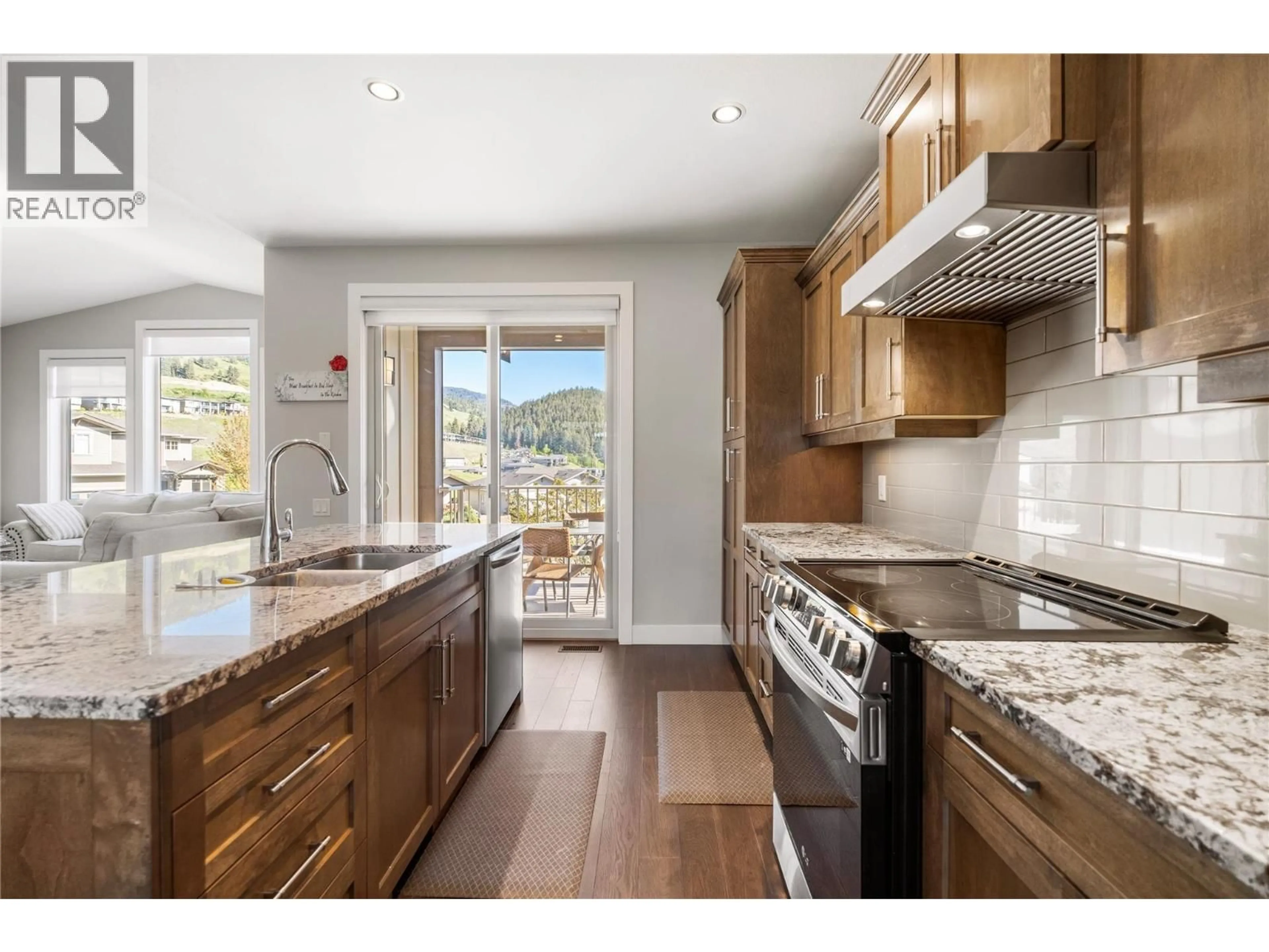 Open concept kitchen, unknown for 1852 SPLIT RAIL PLACE, Kelowna British Columbia V1P1R1