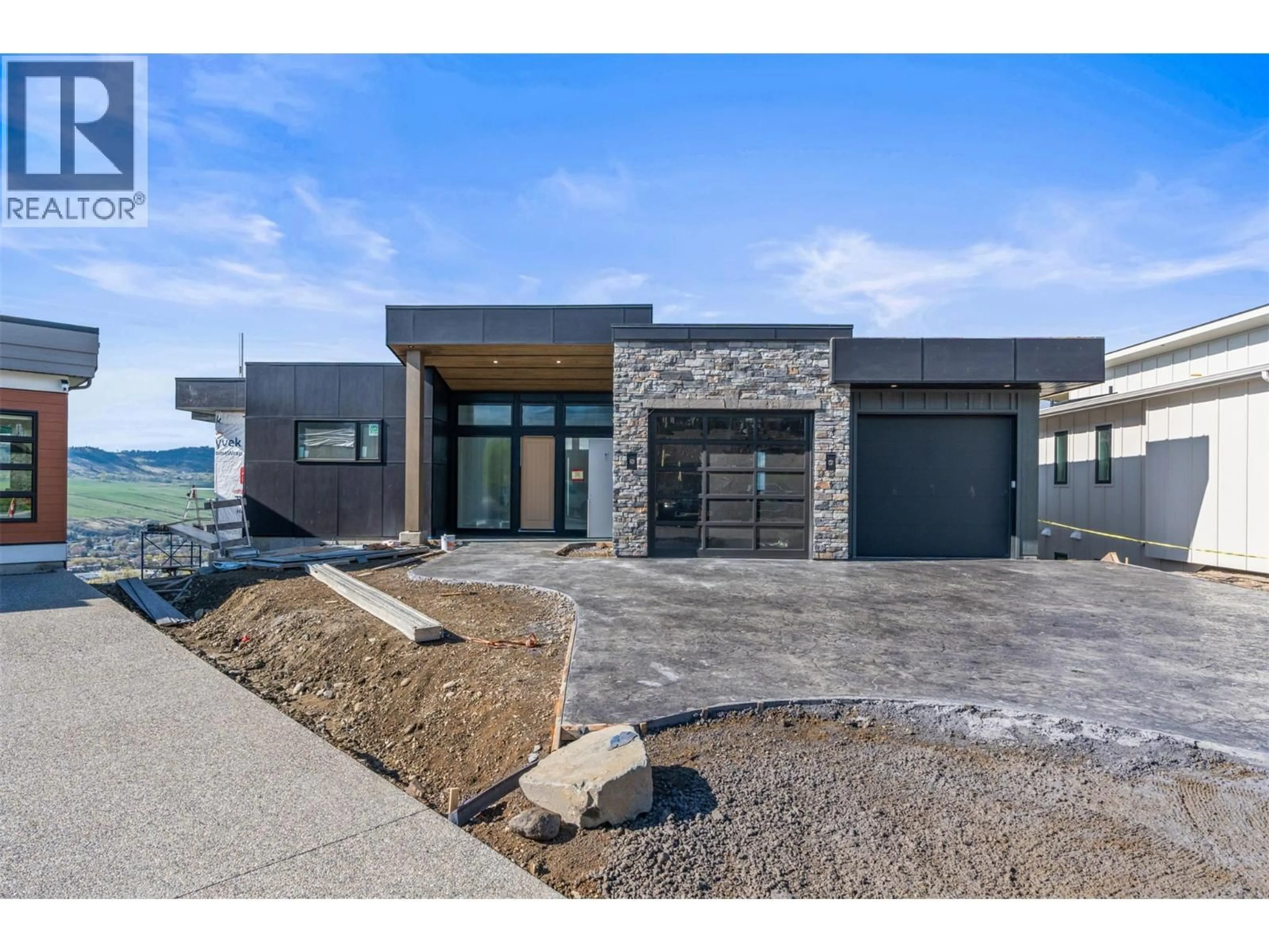 Home with brick exterior material, mountain view for 4379 PAINTED TURTLE DRIVE, Vernon British Columbia V1T9W4