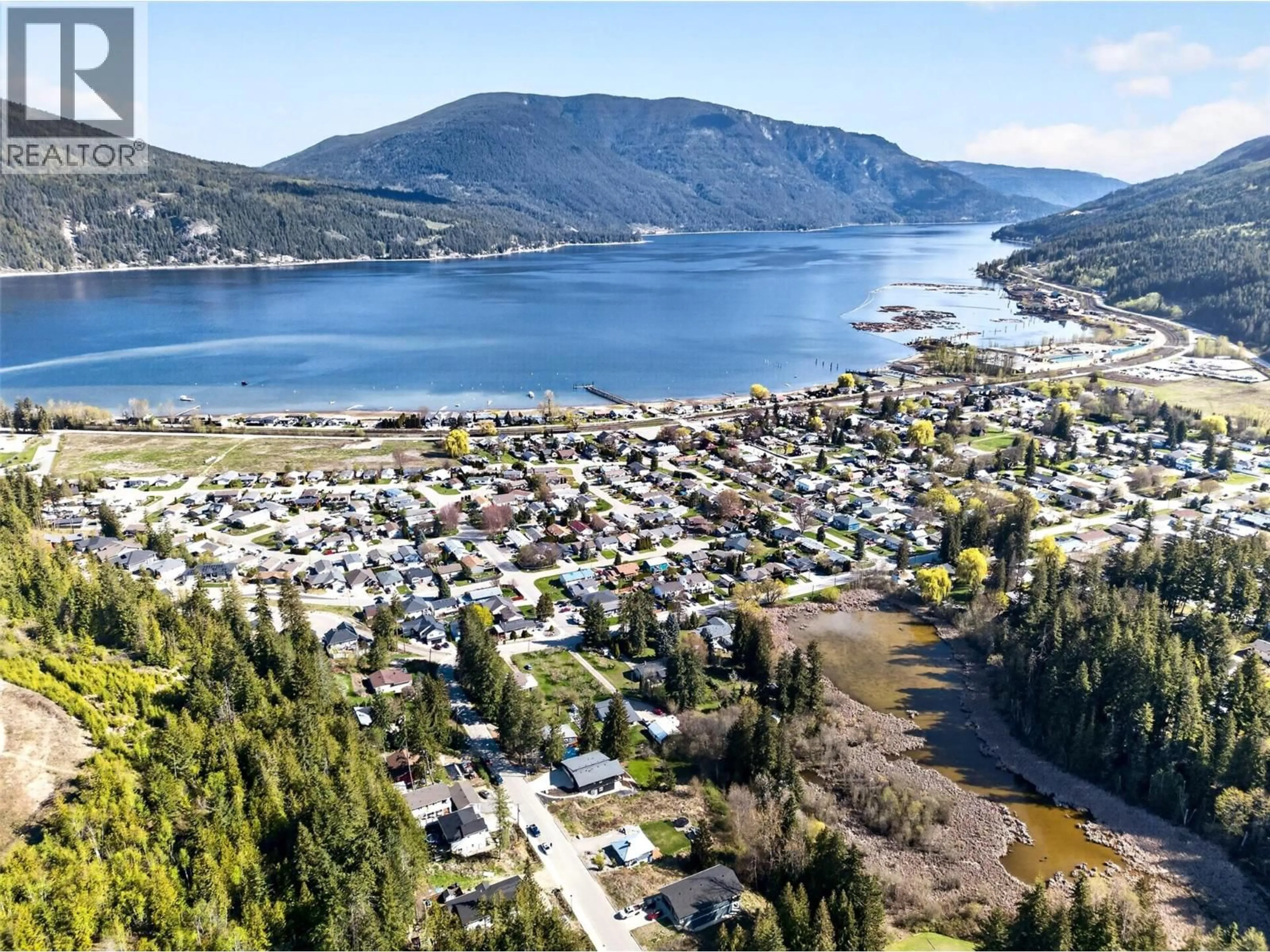 A pic from outside/outdoor area/front of a property/back of a property/a pic from drone, water/lake/river/ocean view for 6841 46 STREET NORTHEAST, Salmon Arm British Columbia V0E1K0