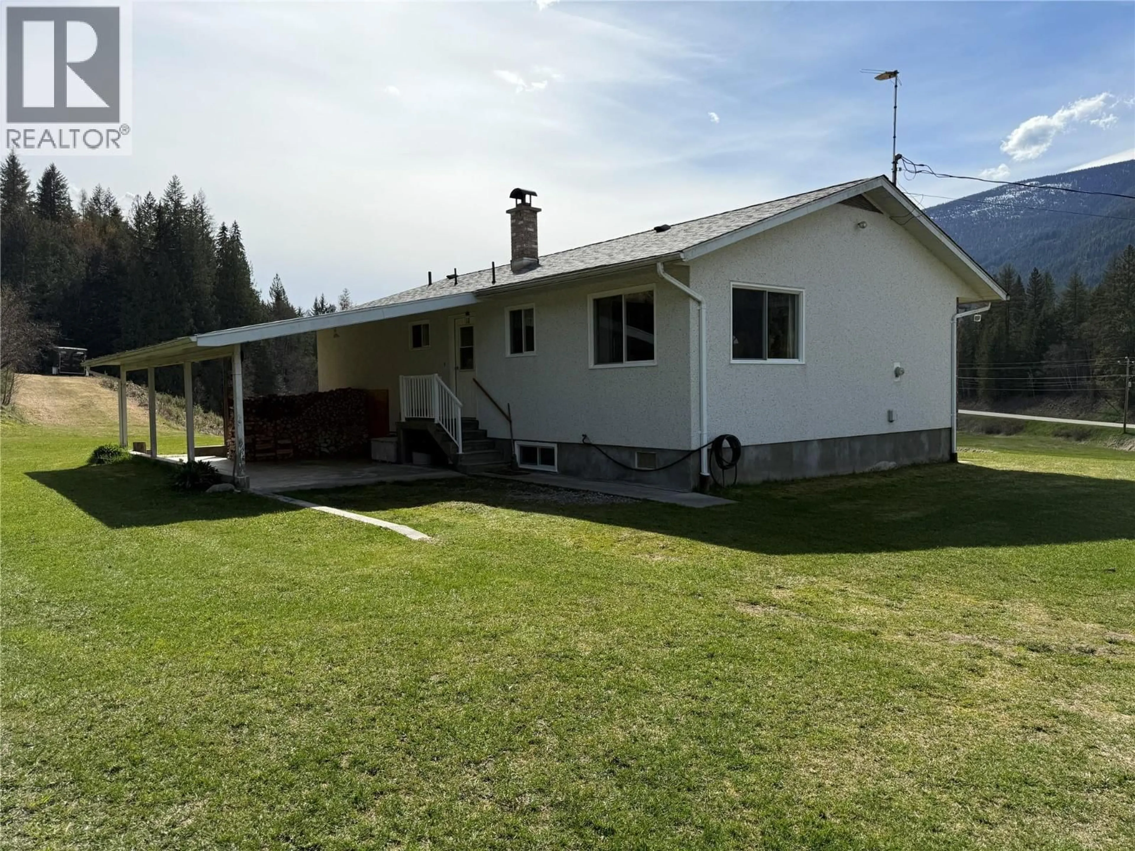 A pic from outside/outdoor area/front of a property/back of a property/a pic from drone, unknown for 6915 KIMOFF ROAD, Appledale British Columbia V0G2J0