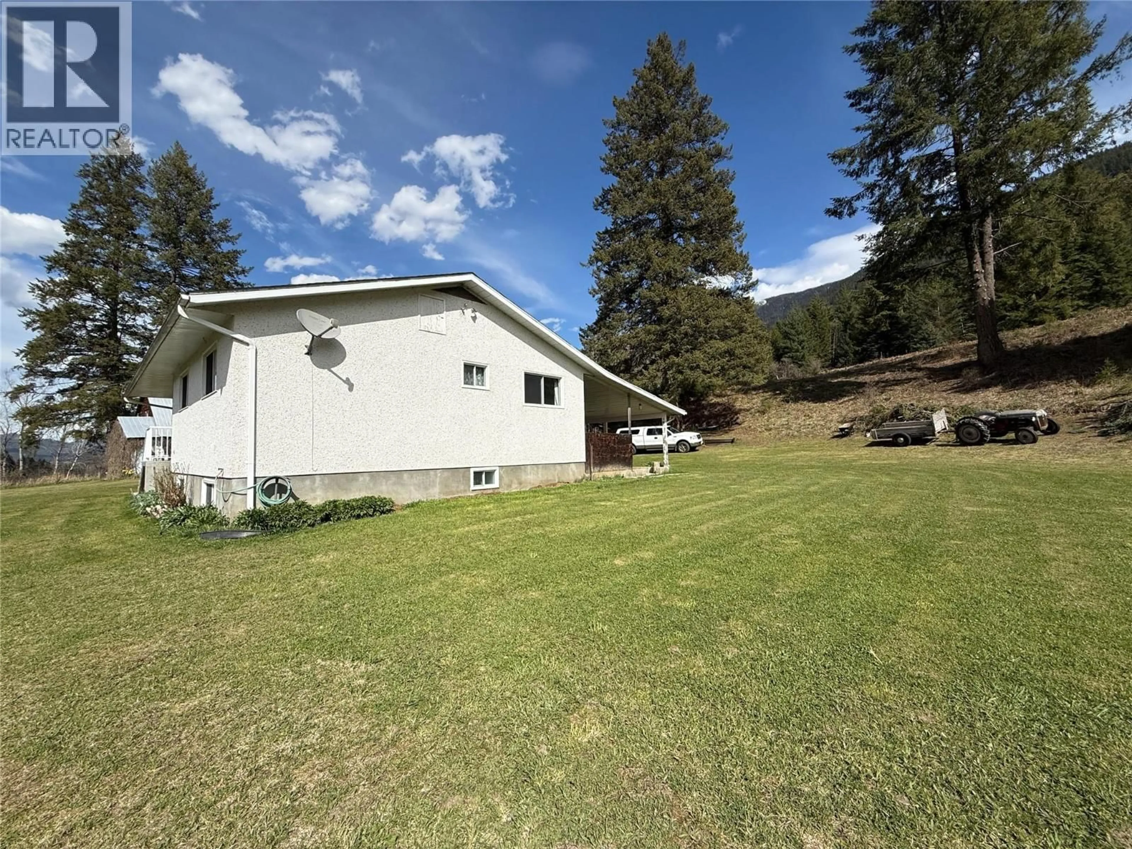 A pic from outside/outdoor area/front of a property/back of a property/a pic from drone, mountain view for 6915 KIMOFF ROAD, Appledale British Columbia V0G2J0
