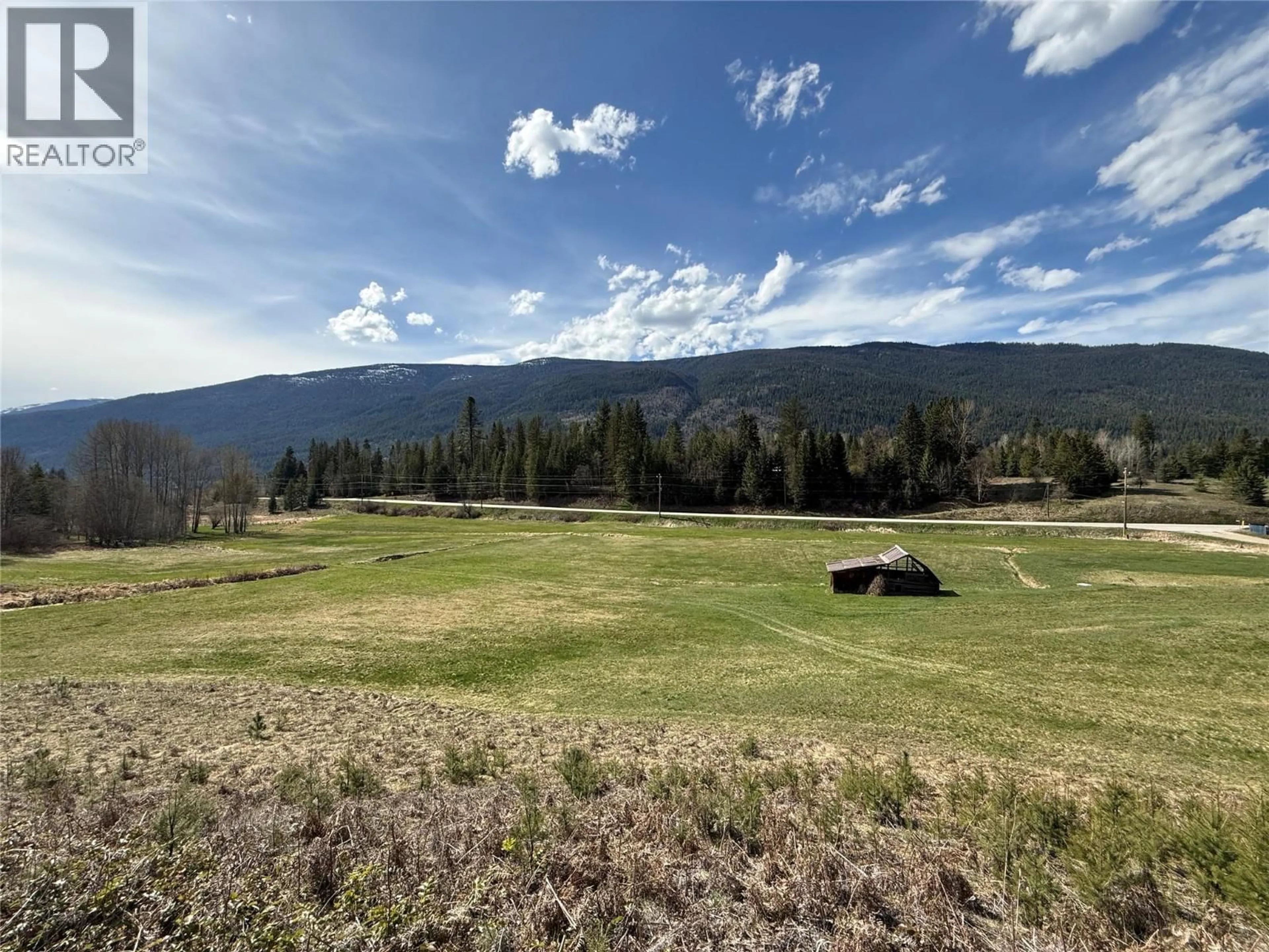 A pic from outside/outdoor area/front of a property/back of a property/a pic from drone, mountain view for 6915 KIMOFF ROAD, Appledale British Columbia V0G2J0