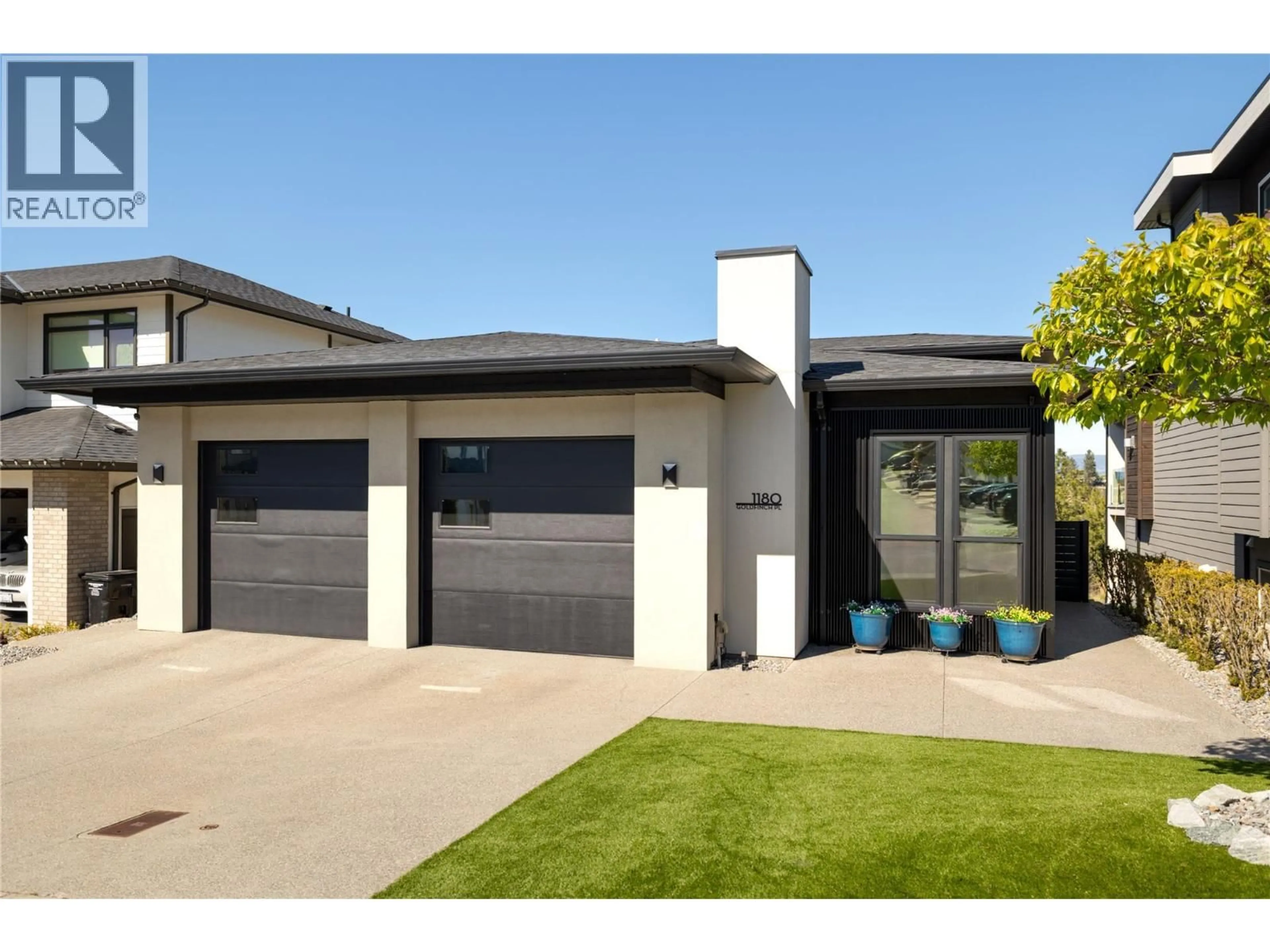 Home with brick exterior material, street for 1180 GOLDFINCH PLACE, Kelowna British Columbia V1W5M1