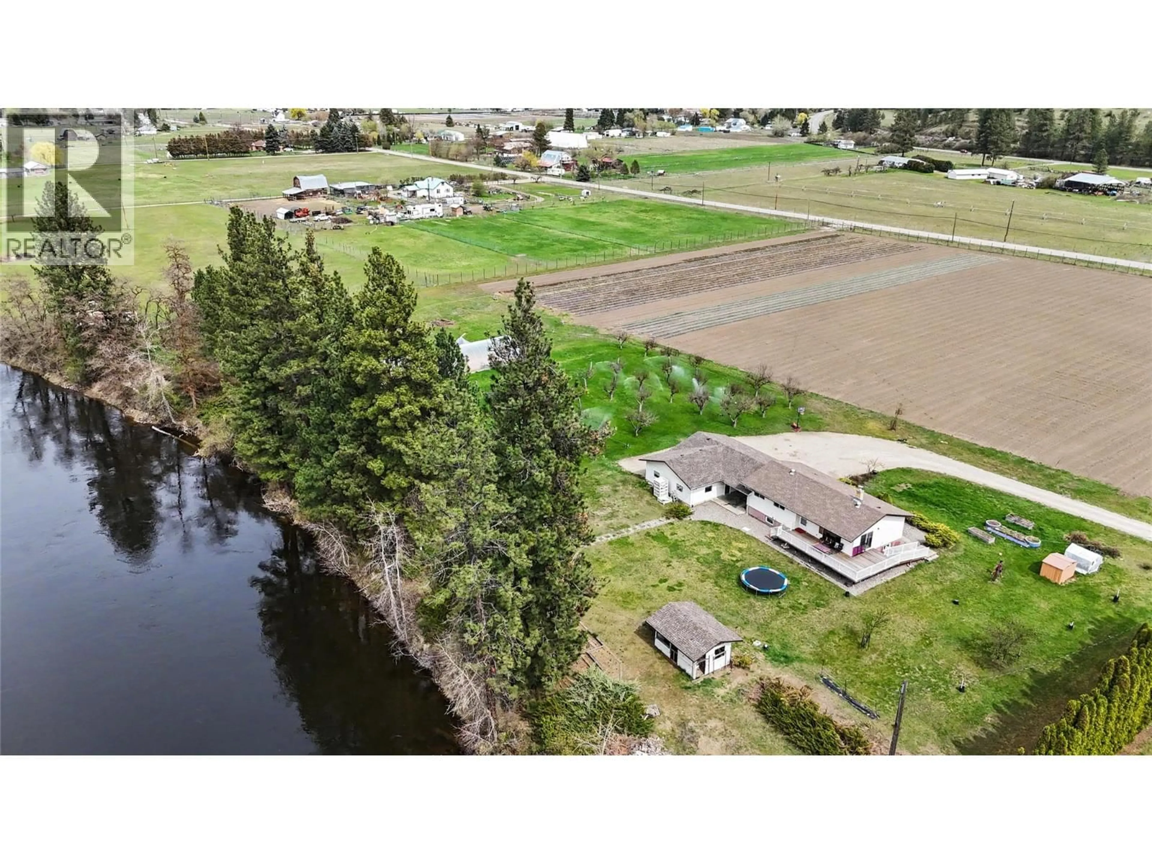 A pic from outside/outdoor area/front of a property/back of a property/a pic from drone, water/lake/river/ocean view for 3845 CARSON ROAD, Grand Forks British Columbia V0H1H4