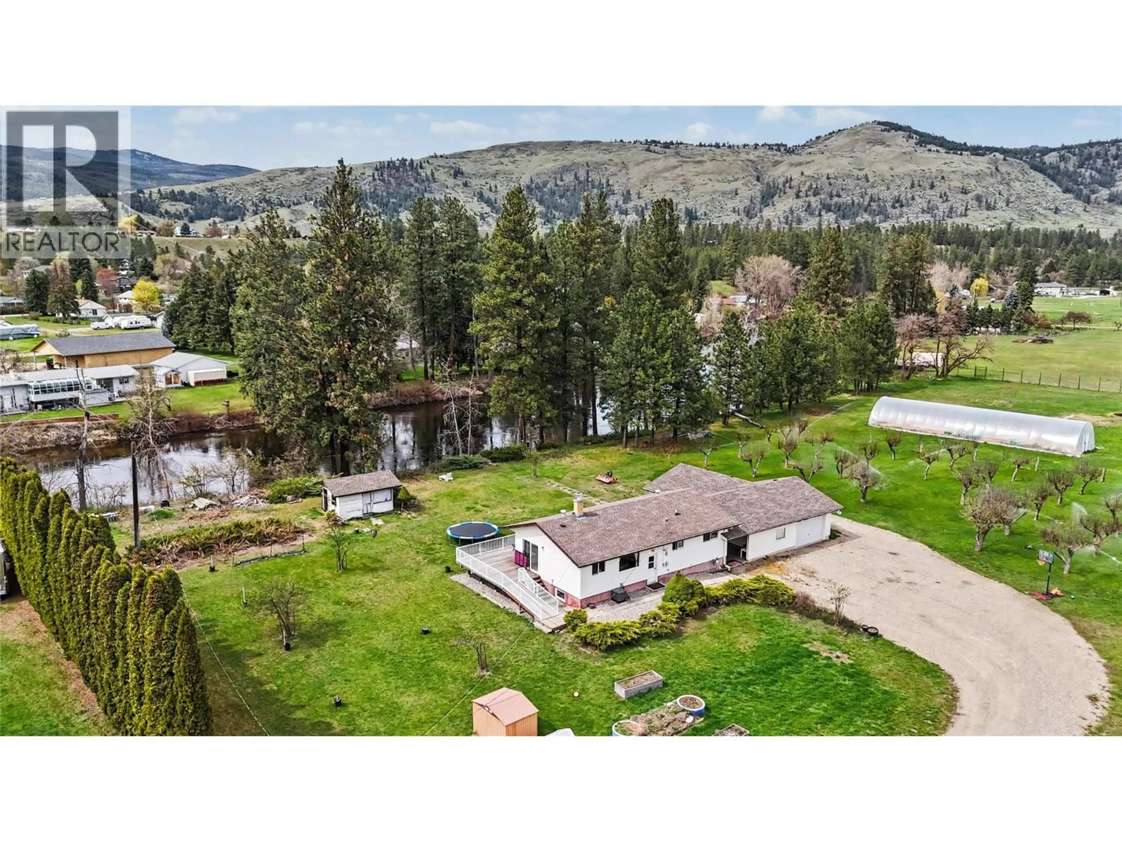 A pic from outside/outdoor area/front of a property/back of a property/a pic from drone, mountain view for 3845 CARSON ROAD, Grand Forks British Columbia V0H1H4