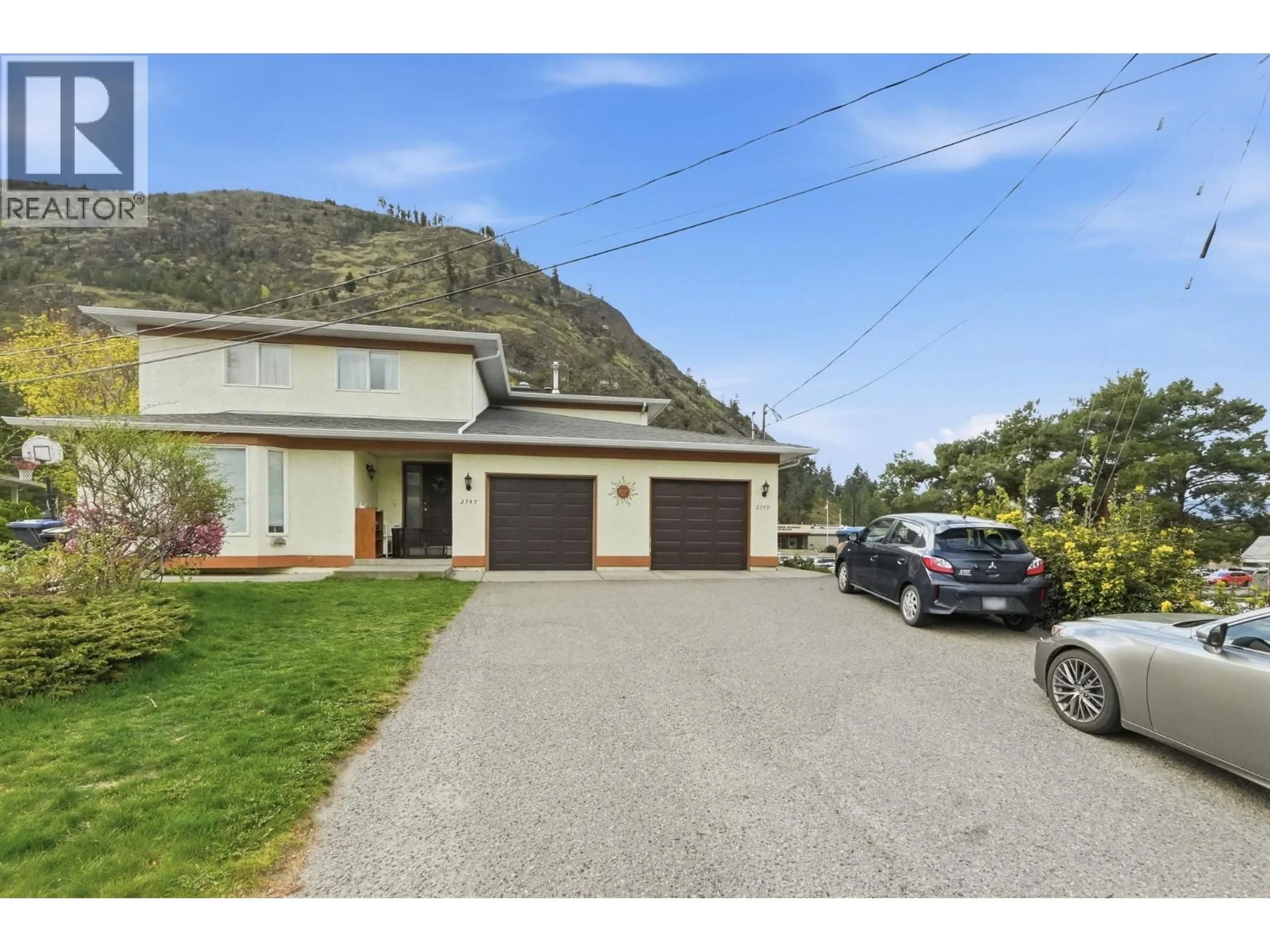 A pic from outside/outdoor area/front of a property/back of a property/a pic from drone, mountain view for 2749 RIFFINGTON PLACE, West Kelowna British Columbia V1Z3L1