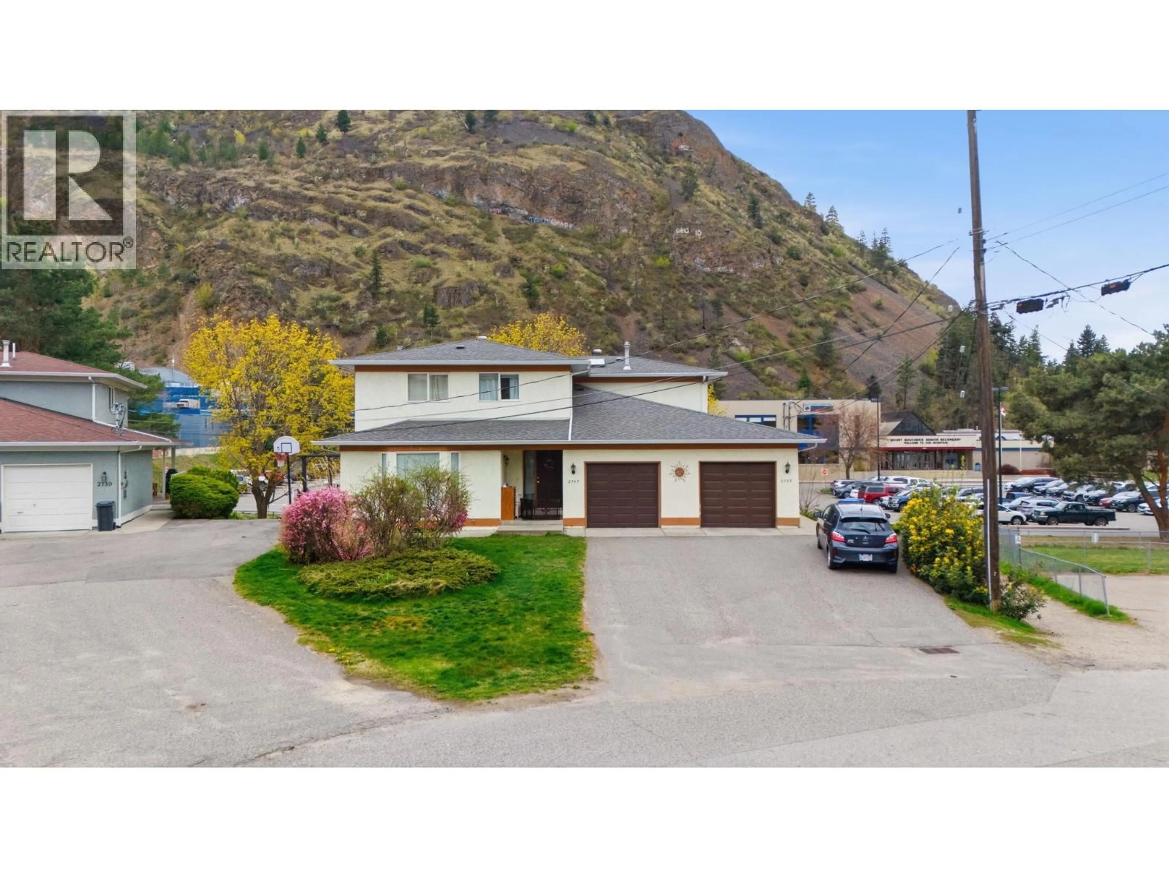 A pic from outside/outdoor area/front of a property/back of a property/a pic from drone, mountain view for 2749 RIFFINGTON PLACE, West Kelowna British Columbia V1Z3L1