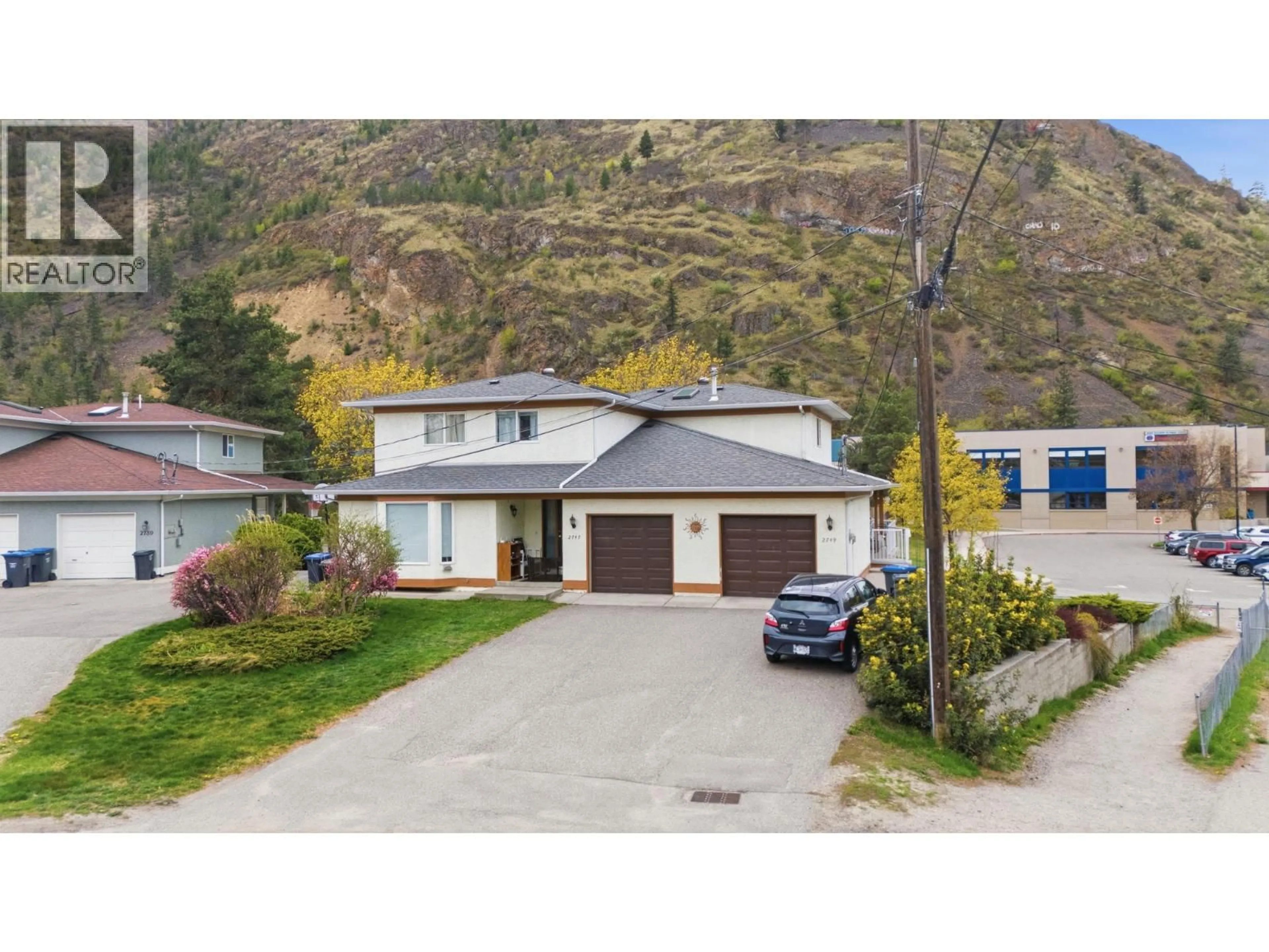 A pic from outside/outdoor area/front of a property/back of a property/a pic from drone, street for 2749 RIFFINGTON PLACE, West Kelowna British Columbia V1Z3L1