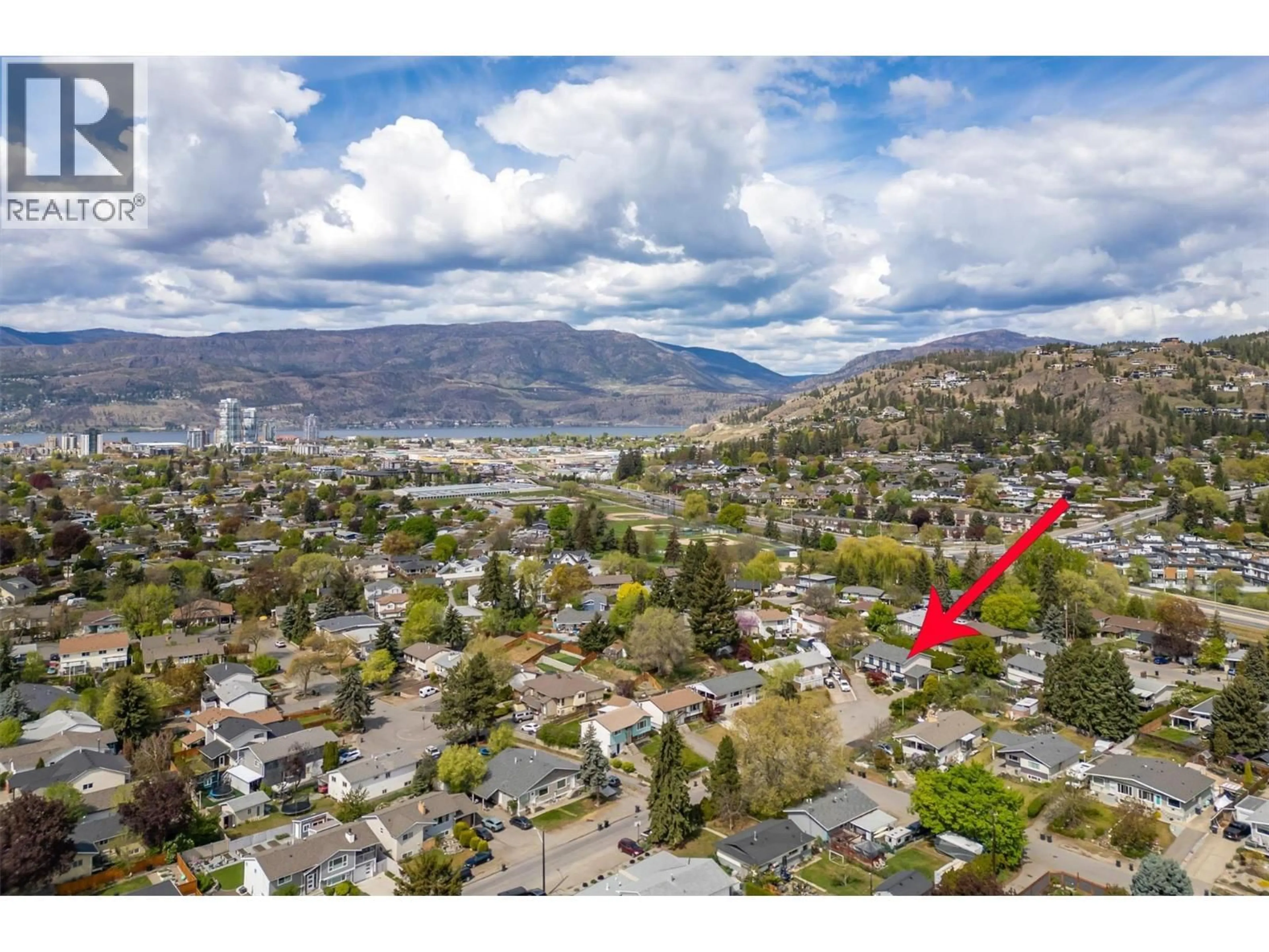 A pic from outside/outdoor area/front of a property/back of a property/a pic from drone, mountain view for 1360 ELM STREET, Kelowna British Columbia V1Y3W6