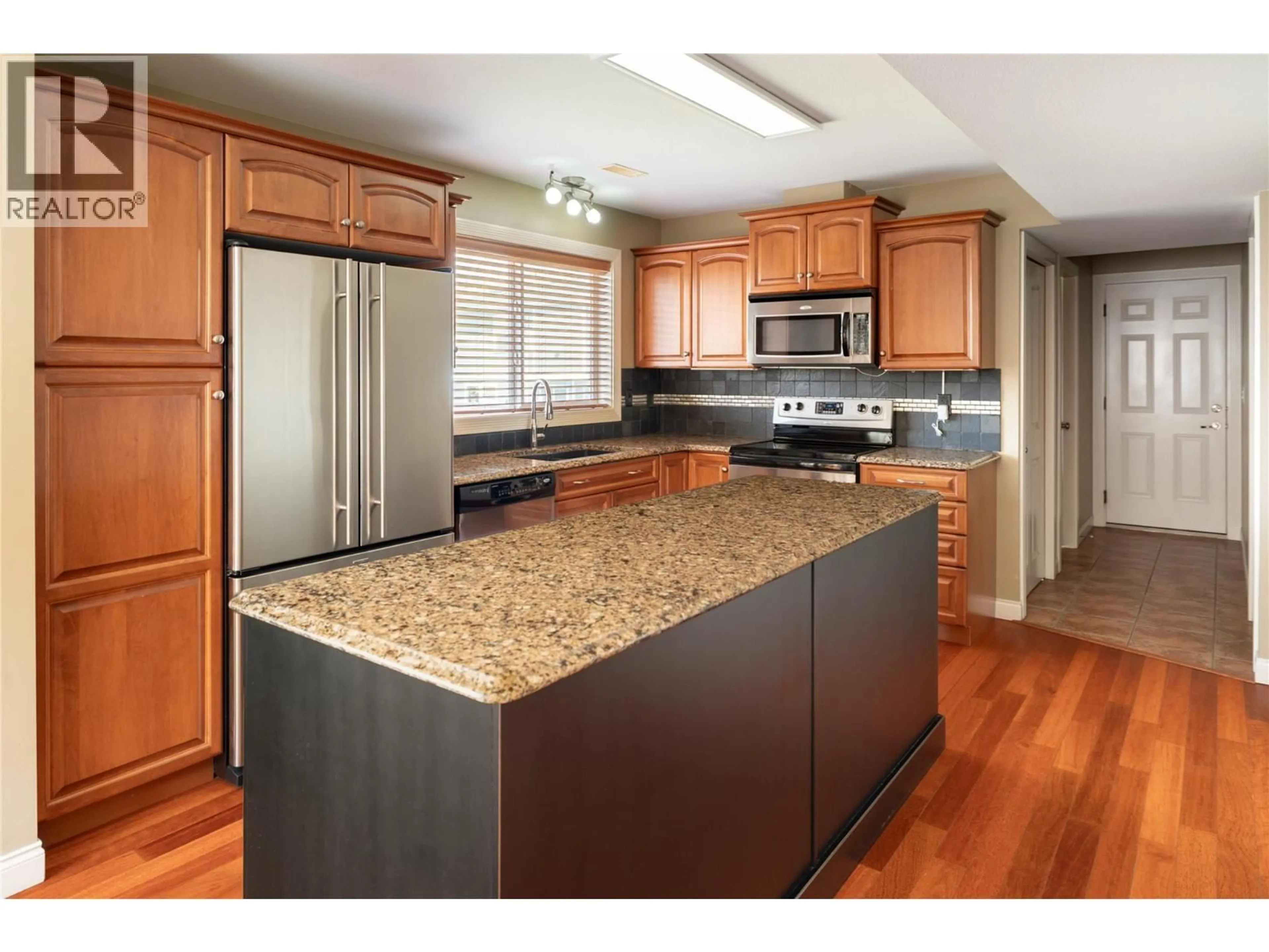 Open concept kitchen, unknown for 940 MAYFAIR ROAD, Kelowna British Columbia V1X5G8