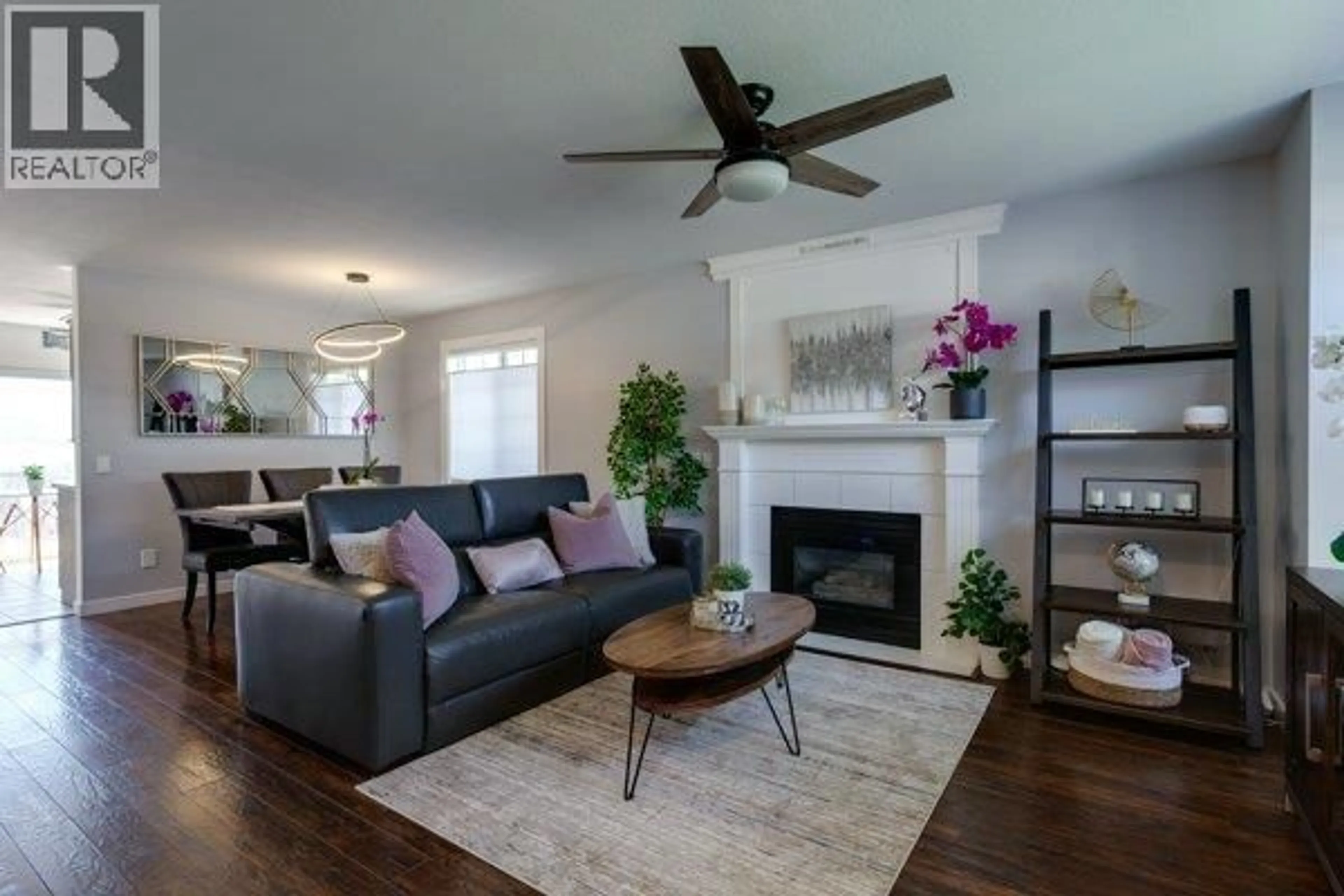 Living room with furniture, wood/laminate floor for 1114 - 2440 OLD OKANAGAN HIGHWAY, West Kelowna British Columbia V4T1X6