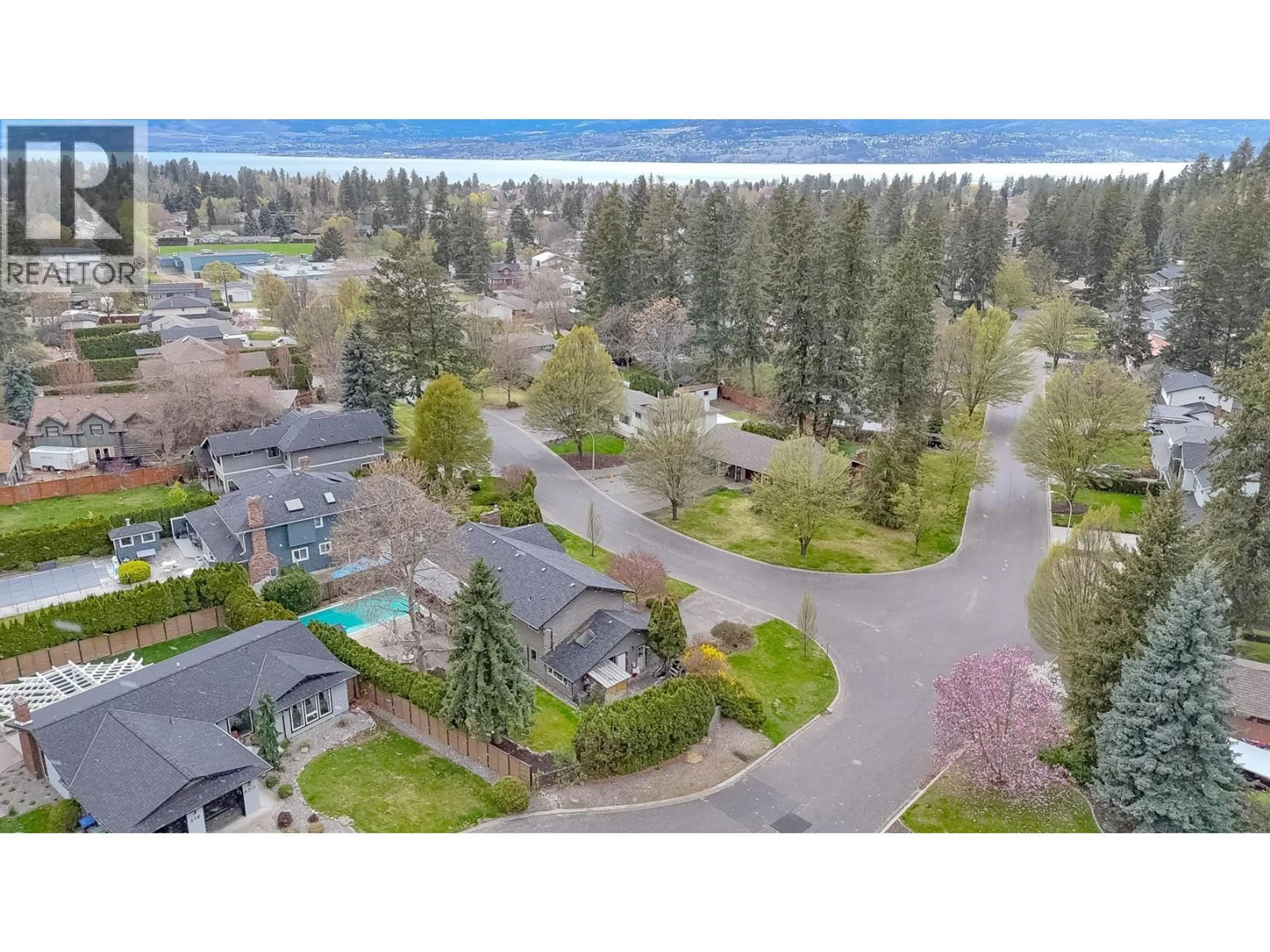 A pic from outside/outdoor area/front of a property/back of a property/a pic from drone, water/lake/river/ocean view for 855 CORONADO CRESCENT, Kelowna British Columbia V1W2K3