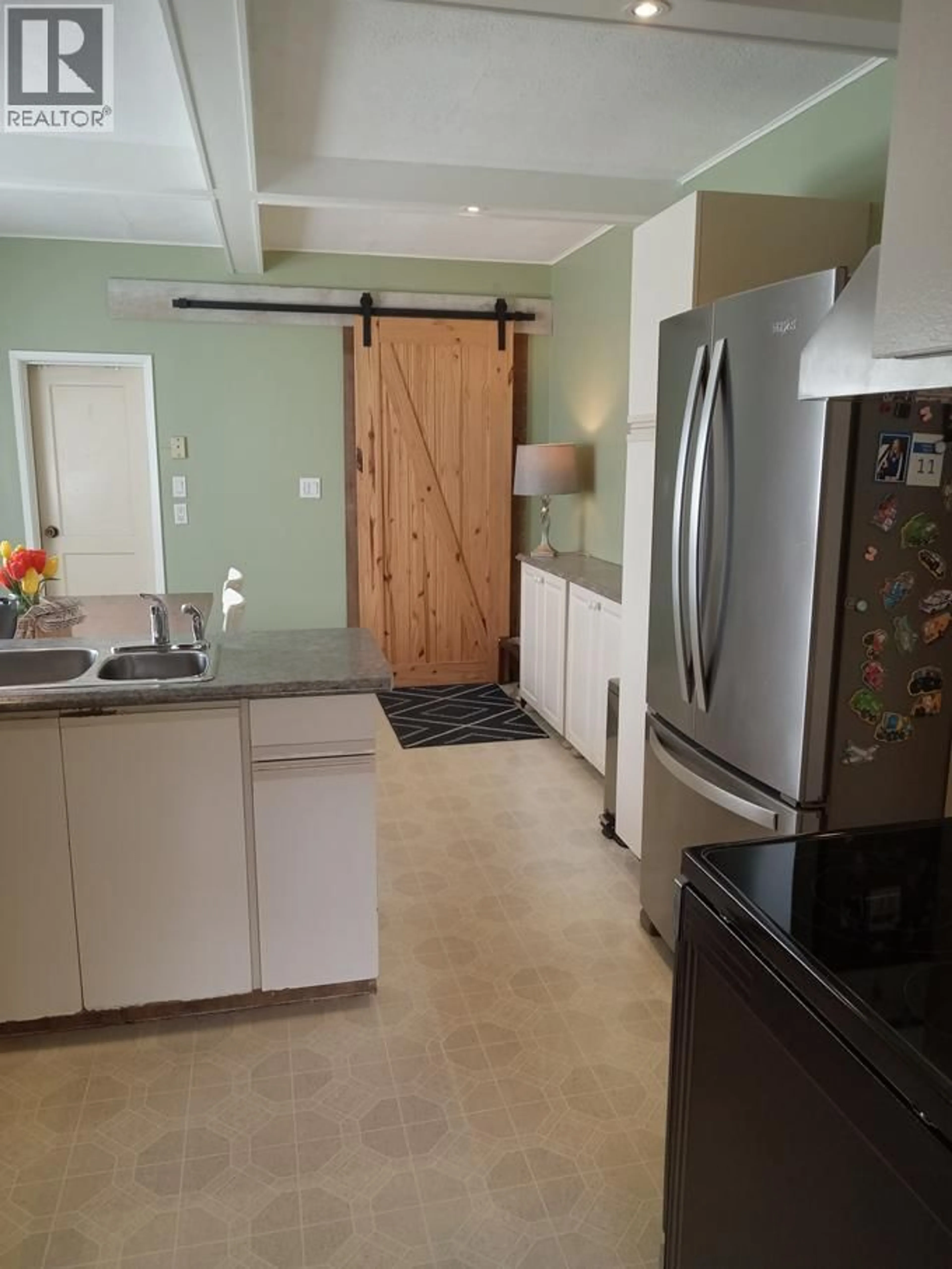 Open concept kitchen, ceramic/tile floor for 4208 33 STREET, Vernon British Columbia V1T5V1
