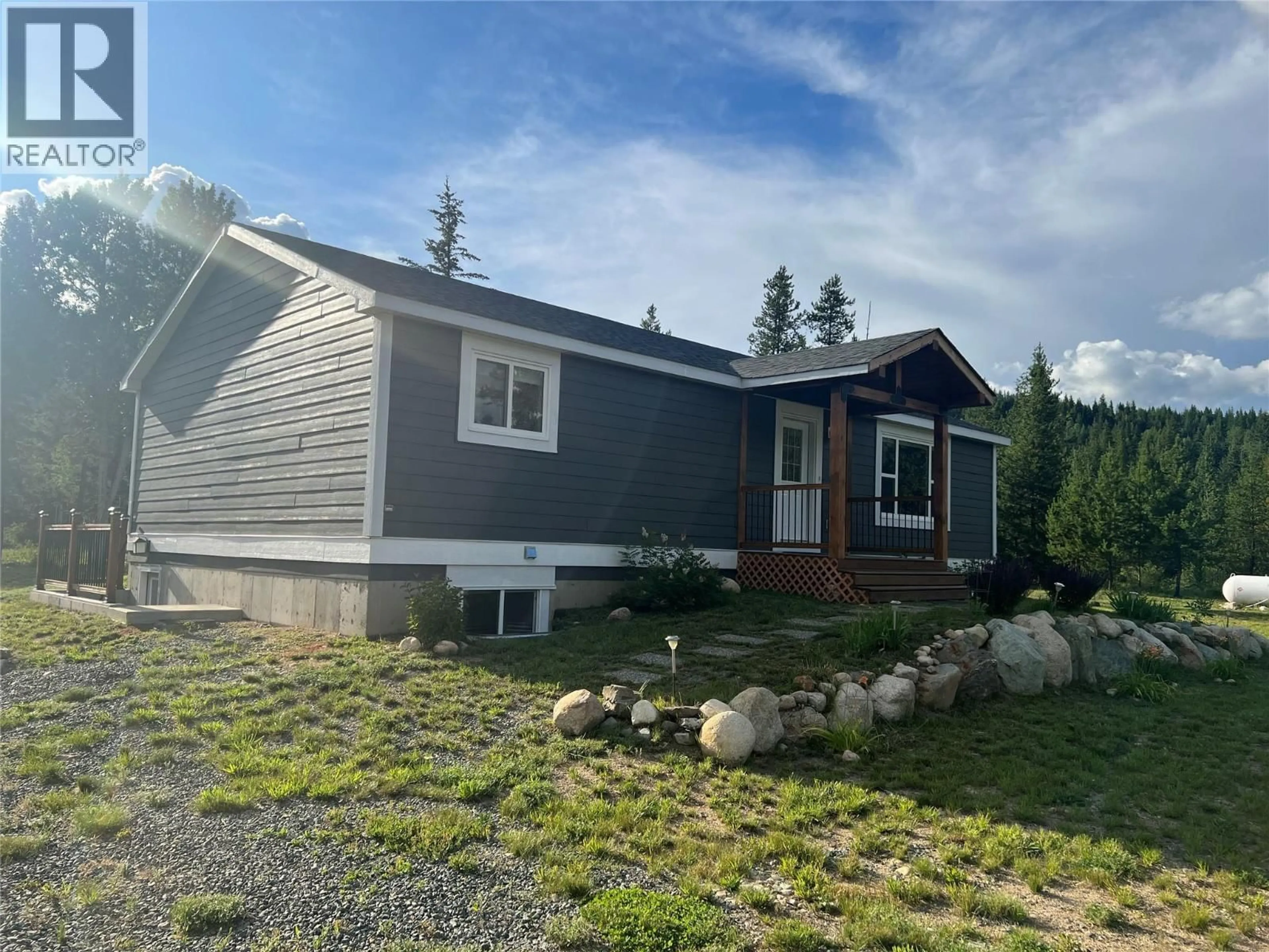 Home with vinyl exterior material, street for 3090 BUFFALO SPRINGS ROAD, Barriere British Columbia V0E1E0