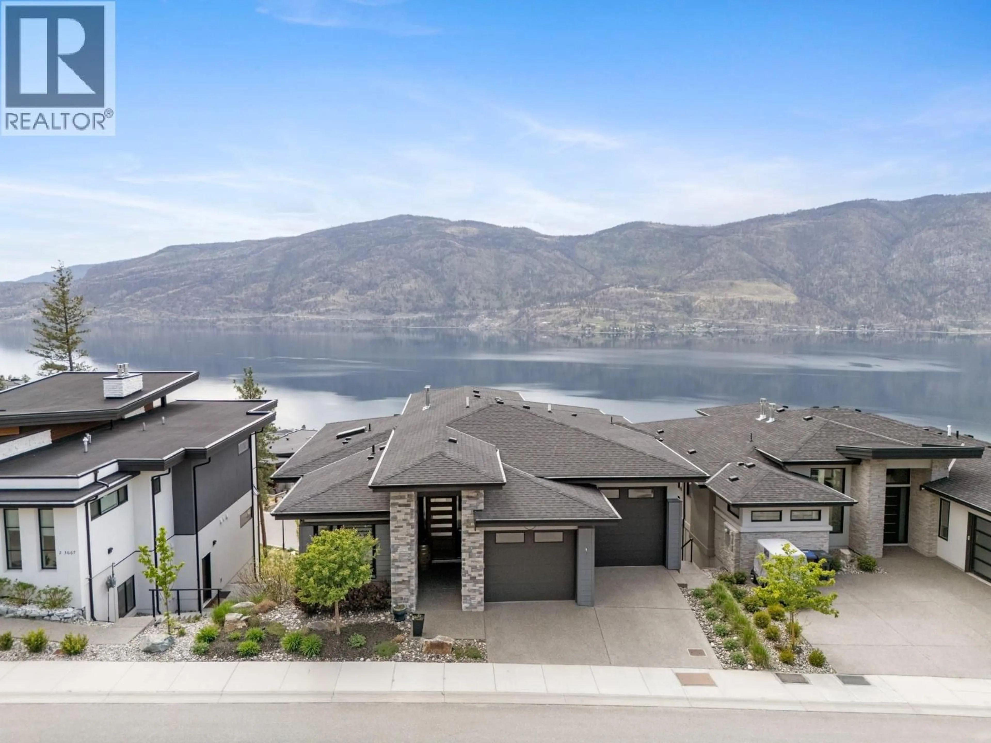A pic from outside/outdoor area/front of a property/back of a property/a pic from drone, water/lake/river/ocean view for 3663 MCKINLEY BEACH DRIVE, Kelowna British Columbia V1V3G2