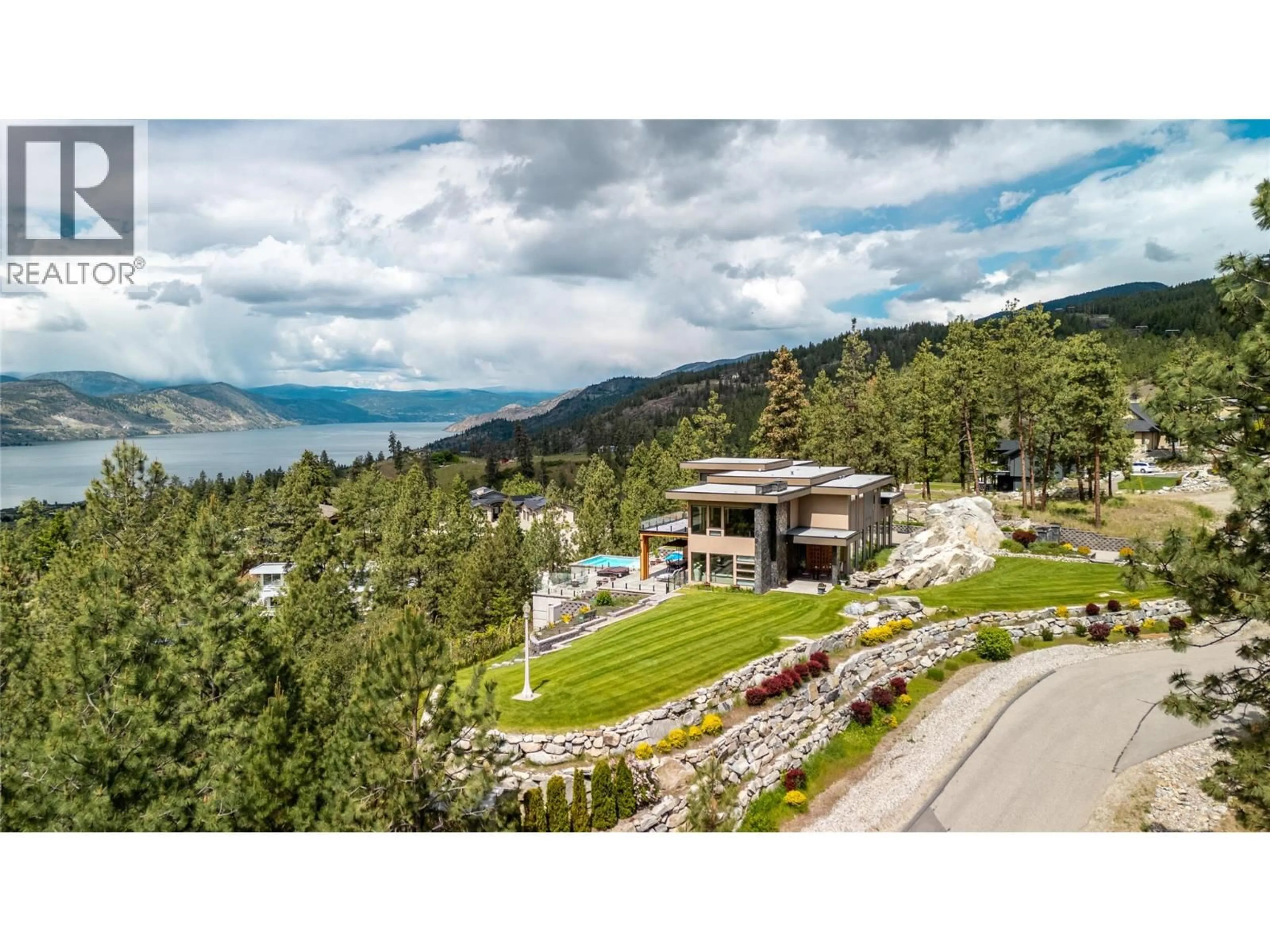 A pic from outside/outdoor area/front of a property/back of a property/a pic from drone, water/lake/river/ocean view for 121 FLAGSTONE RISE, Naramata British Columbia V0H1N0