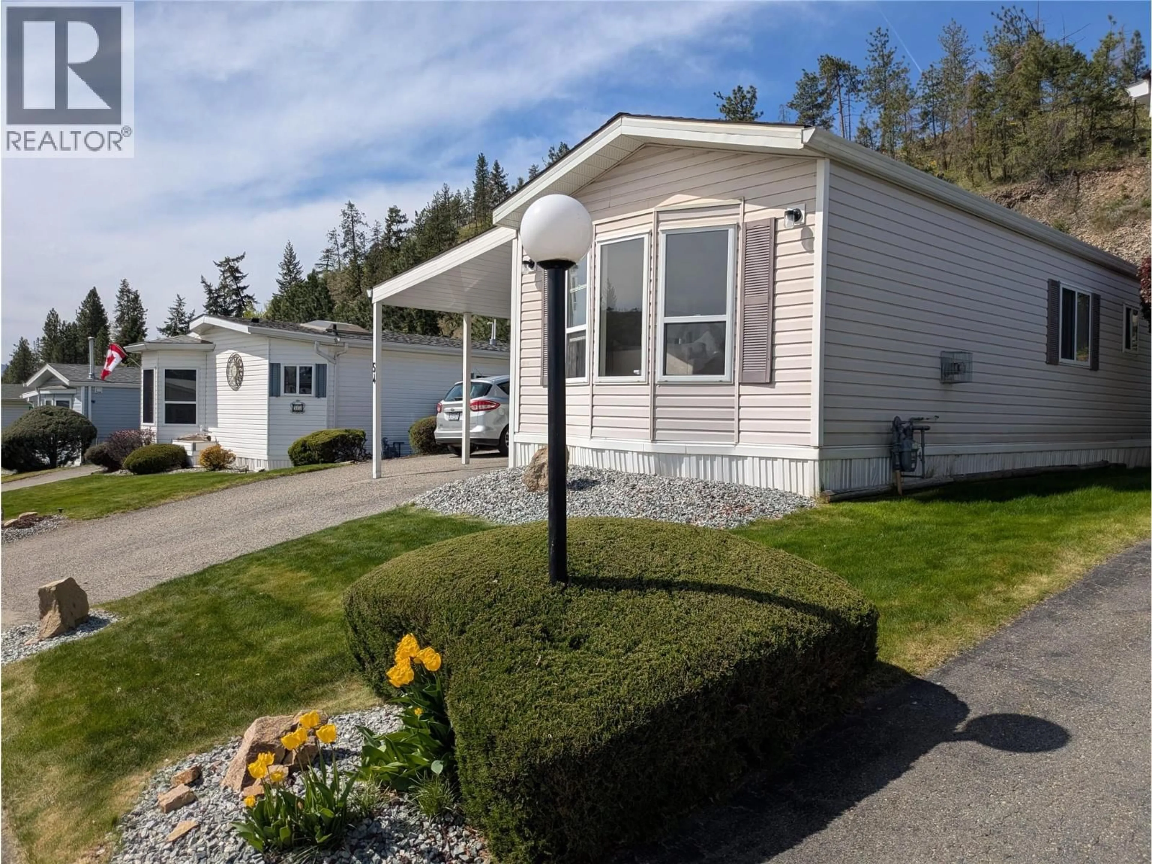 Home with vinyl exterior material, street for 54 - 1850 SHANNON LAKE ROAD, West Kelowna British Columbia V4T1L6