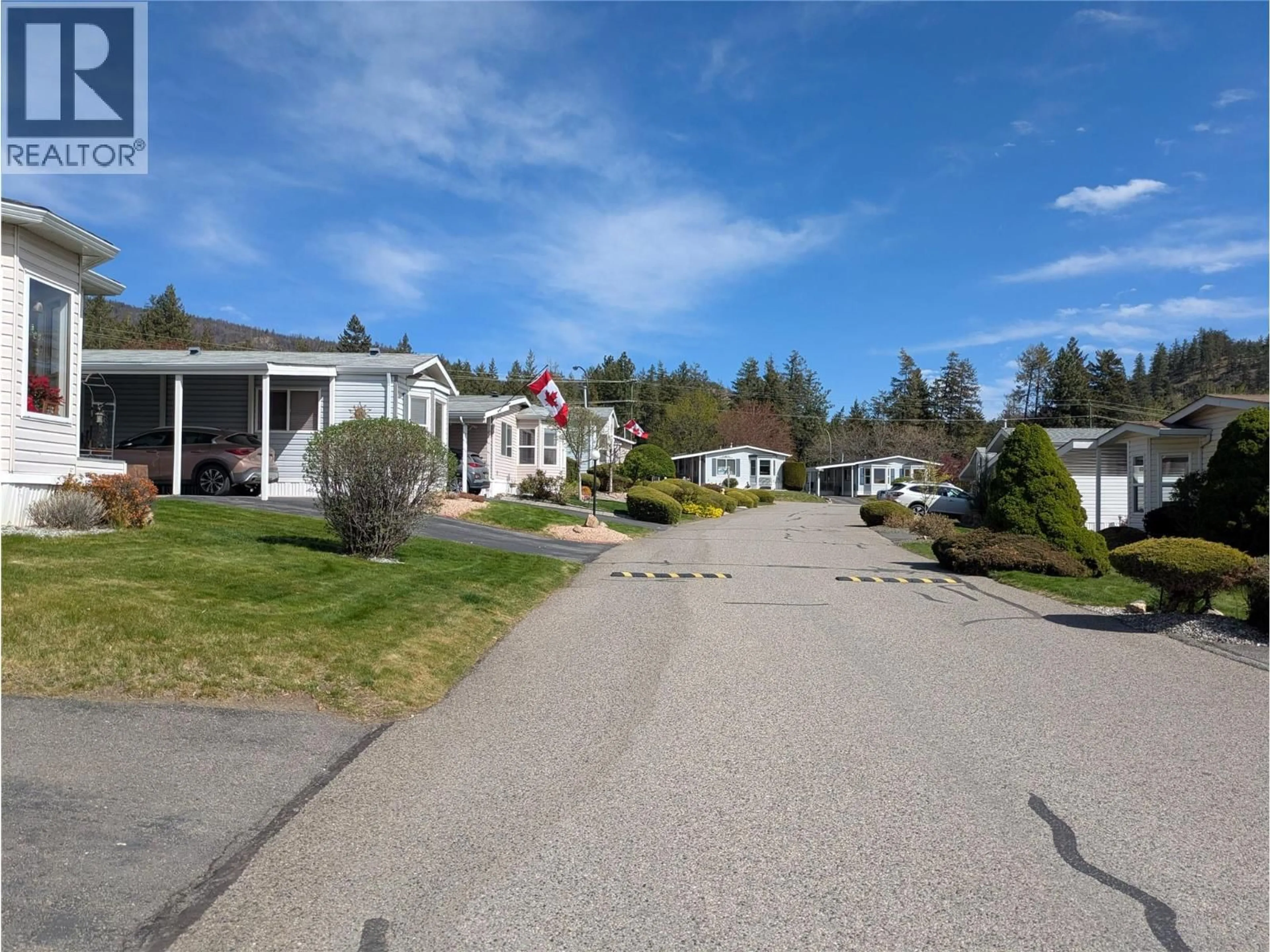 A pic from outside/outdoor area/front of a property/back of a property/a pic from drone, street for 54 - 1850 SHANNON LAKE ROAD, West Kelowna British Columbia V4T1L6