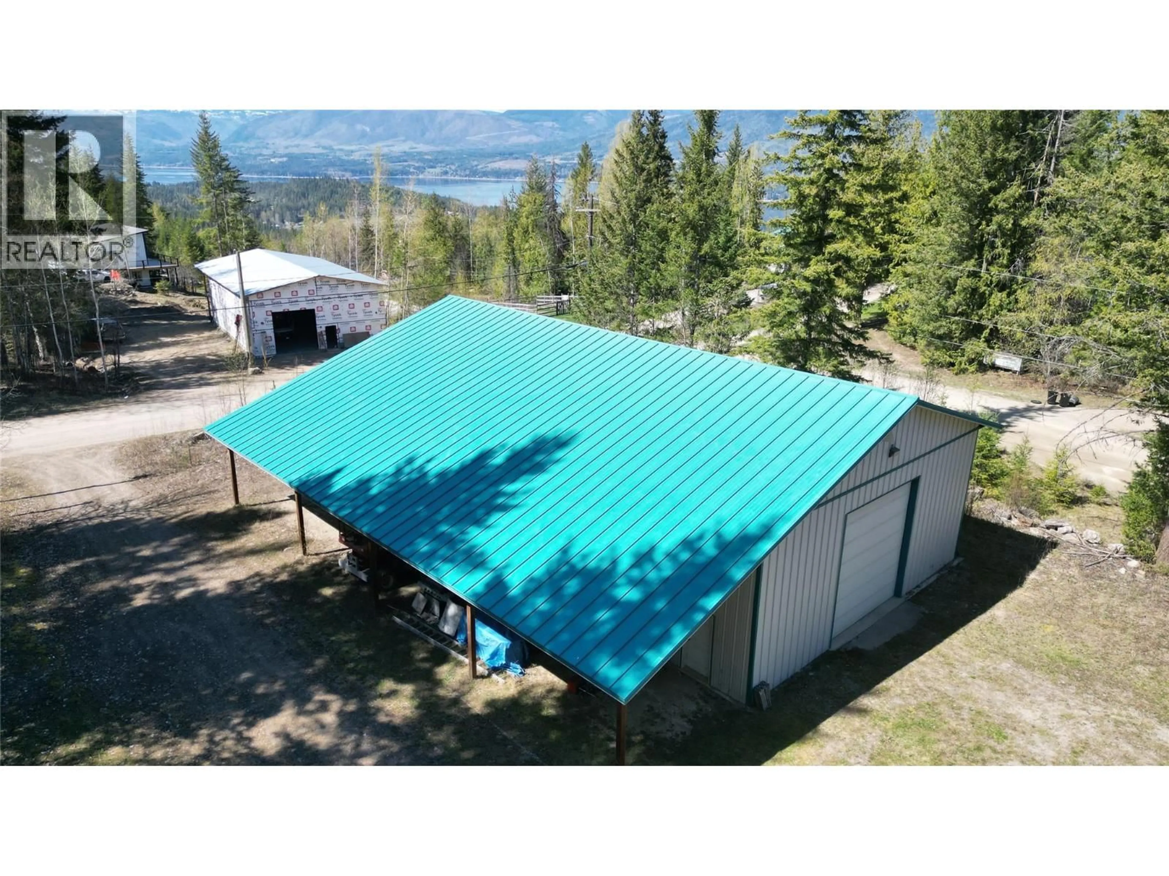 A pic from outside/outdoor area/front of a property/back of a property/a pic from drone, mountain view for 3840 CAMERON ROAD, Eagle Bay British Columbia V0E1T0