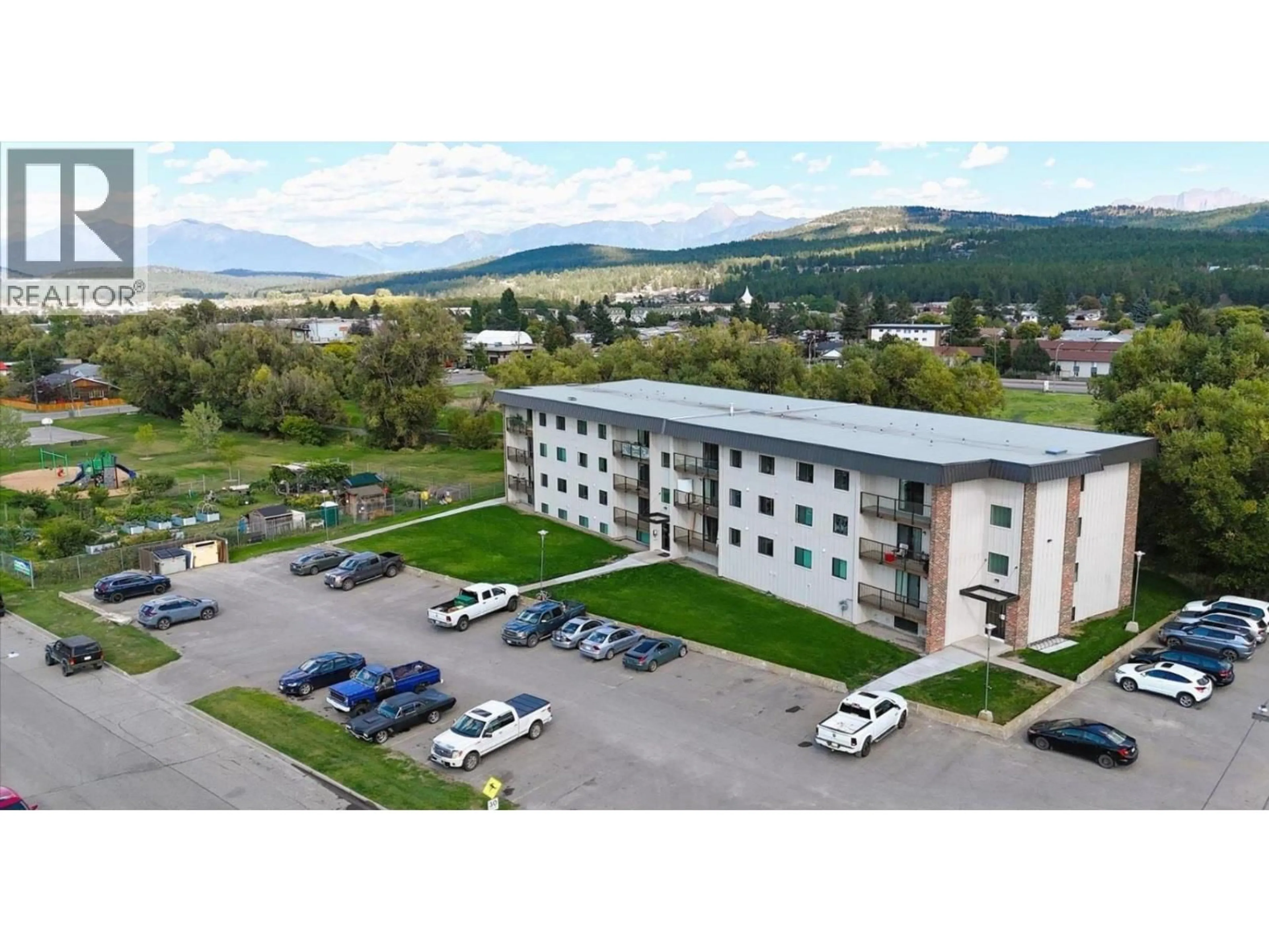 A pic from outside/outdoor area/front of a property/back of a property/a pic from drone, mountain view for 407 - 606 18TH AVENUE NORTH, Cranbrook British Columbia V1C5M1