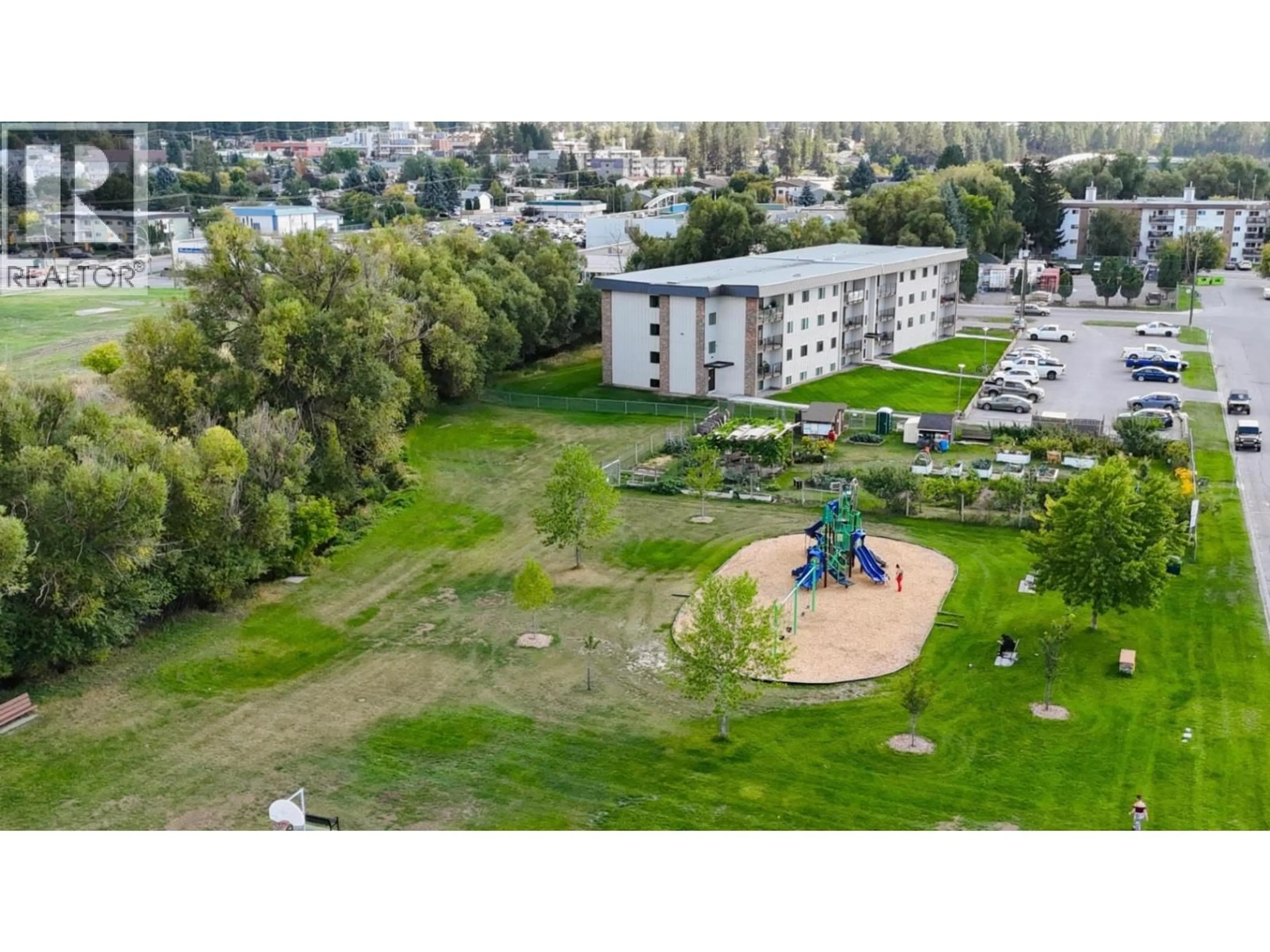 A pic from outside/outdoor area/front of a property/back of a property/a pic from drone, mountain view for 407 - 606 18TH AVENUE NORTH, Cranbrook British Columbia V1C5M1