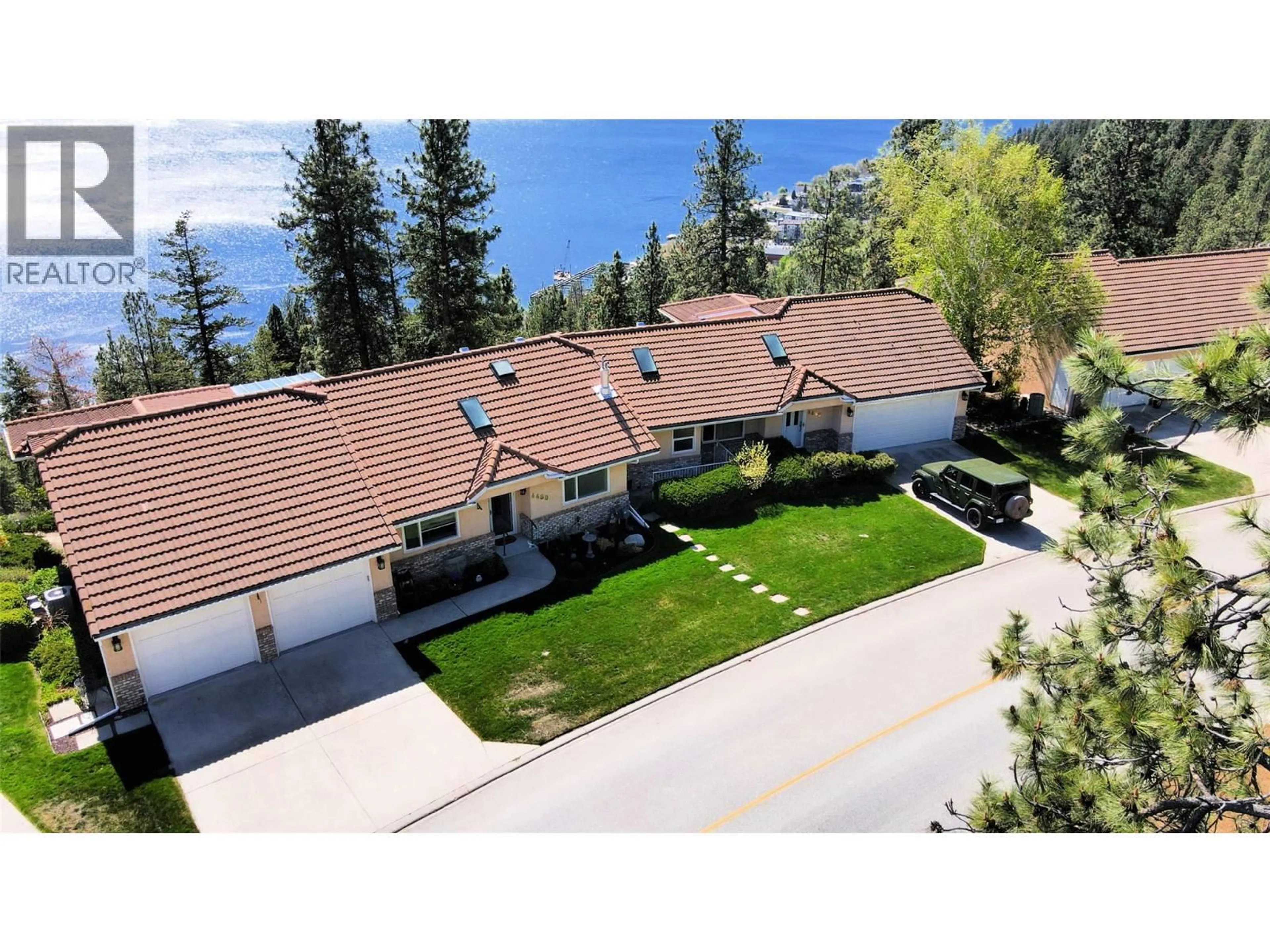A pic from outside/outdoor area/front of a property/back of a property/a pic from drone, mountain view for 4480 PONDEROSA DRIVE, Peachland British Columbia V0H1X5