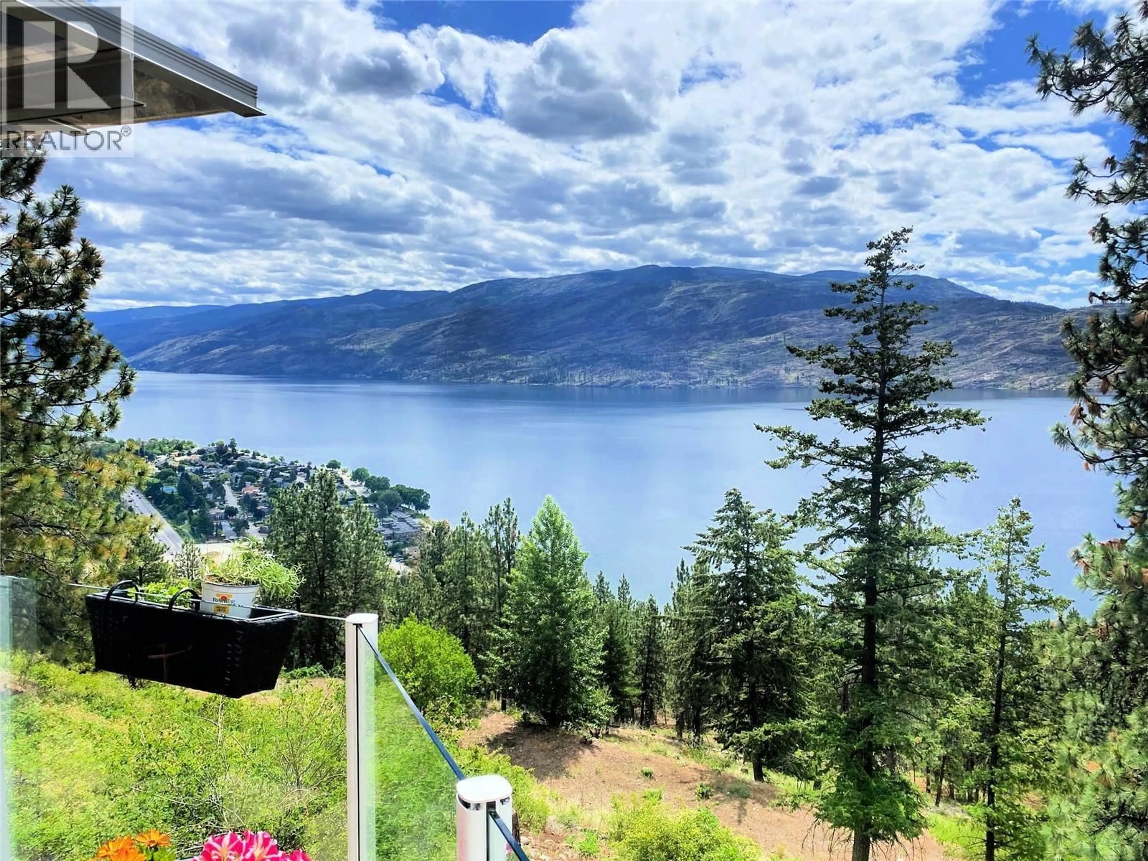 A pic from outside/outdoor area/front of a property/back of a property/a pic from drone, water/lake/river/ocean view for 4480 PONDEROSA DRIVE, Peachland British Columbia V0H1X5