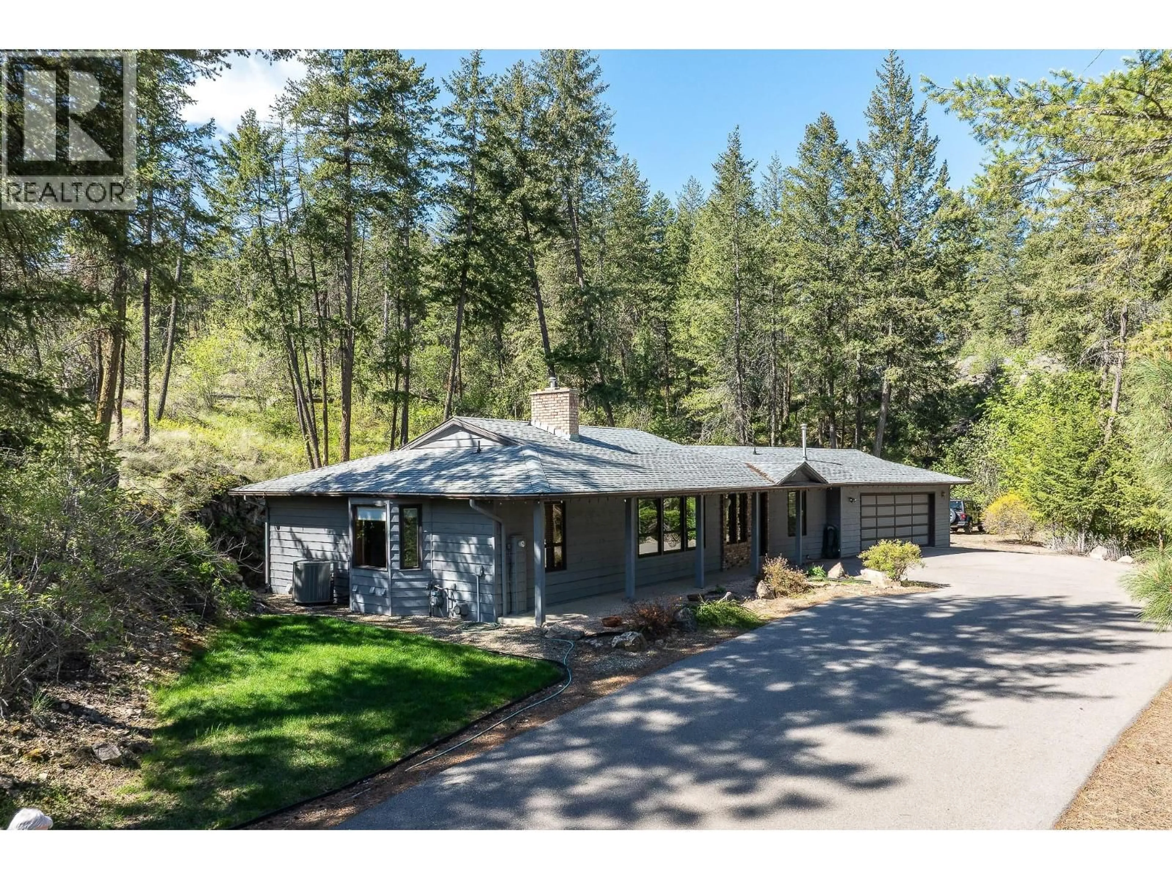 Home with vinyl exterior material, forest/trees view for 9276 CHINOOK ROAD, Vernon British Columbia V1H1K3