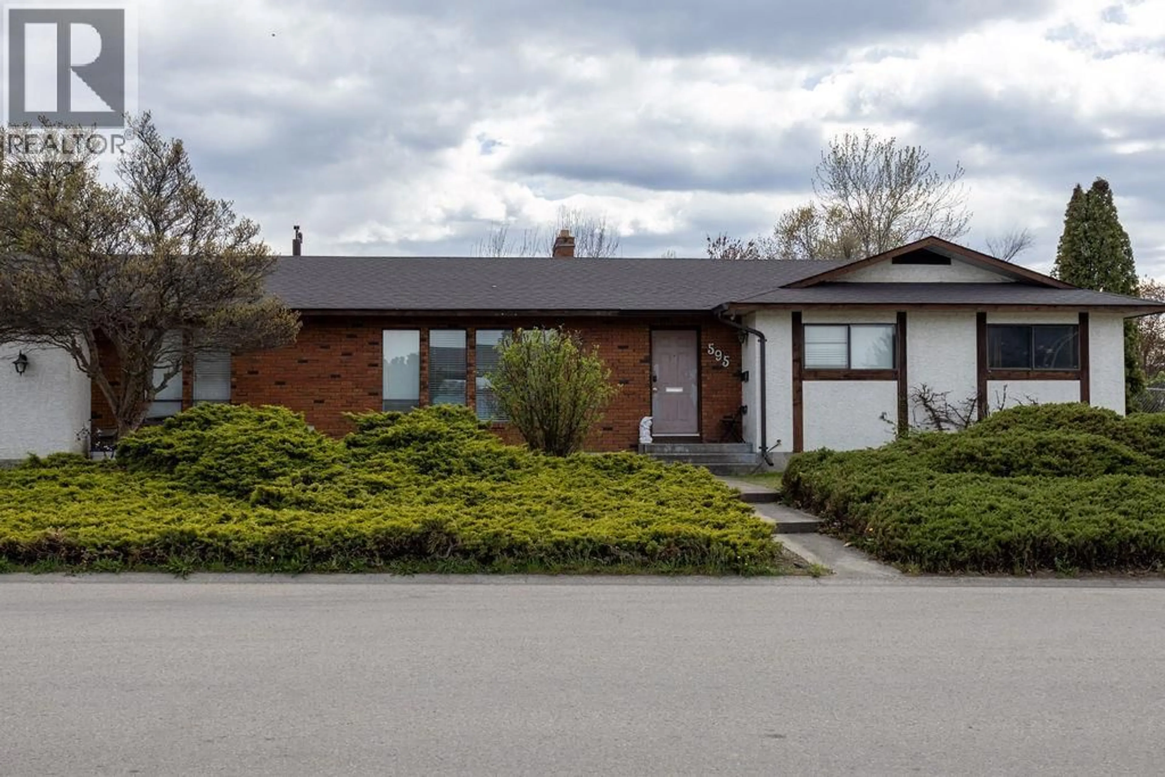 Home with brick exterior material, street for 595 MCWILLIAMS ROAD, Kelowna British Columbia V1X7M2
